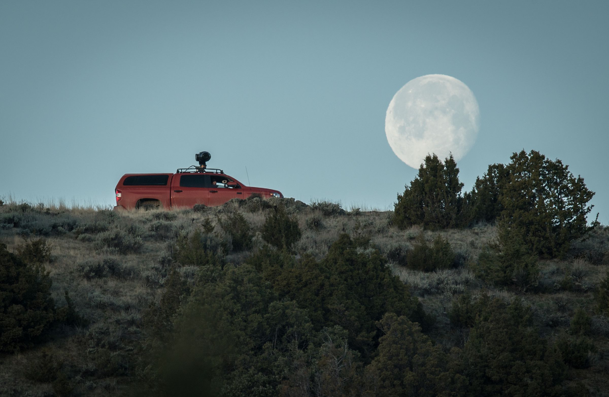 Truck with the Shotover F1 camera mount, and the moon in the background. 