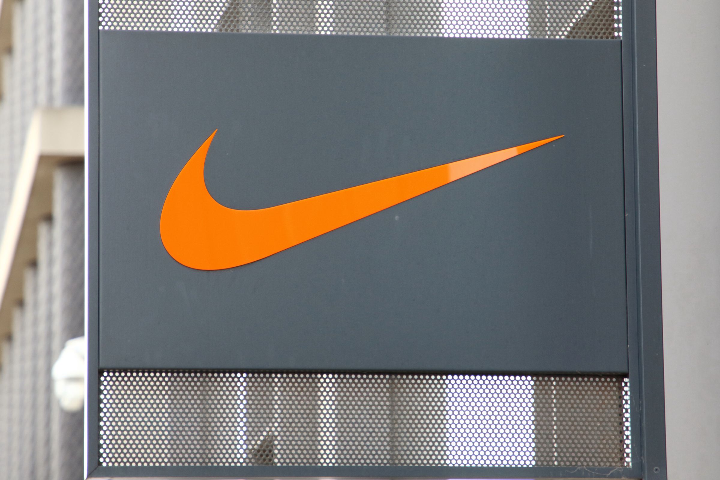 Nike Swoosh logo outside a Nike shop