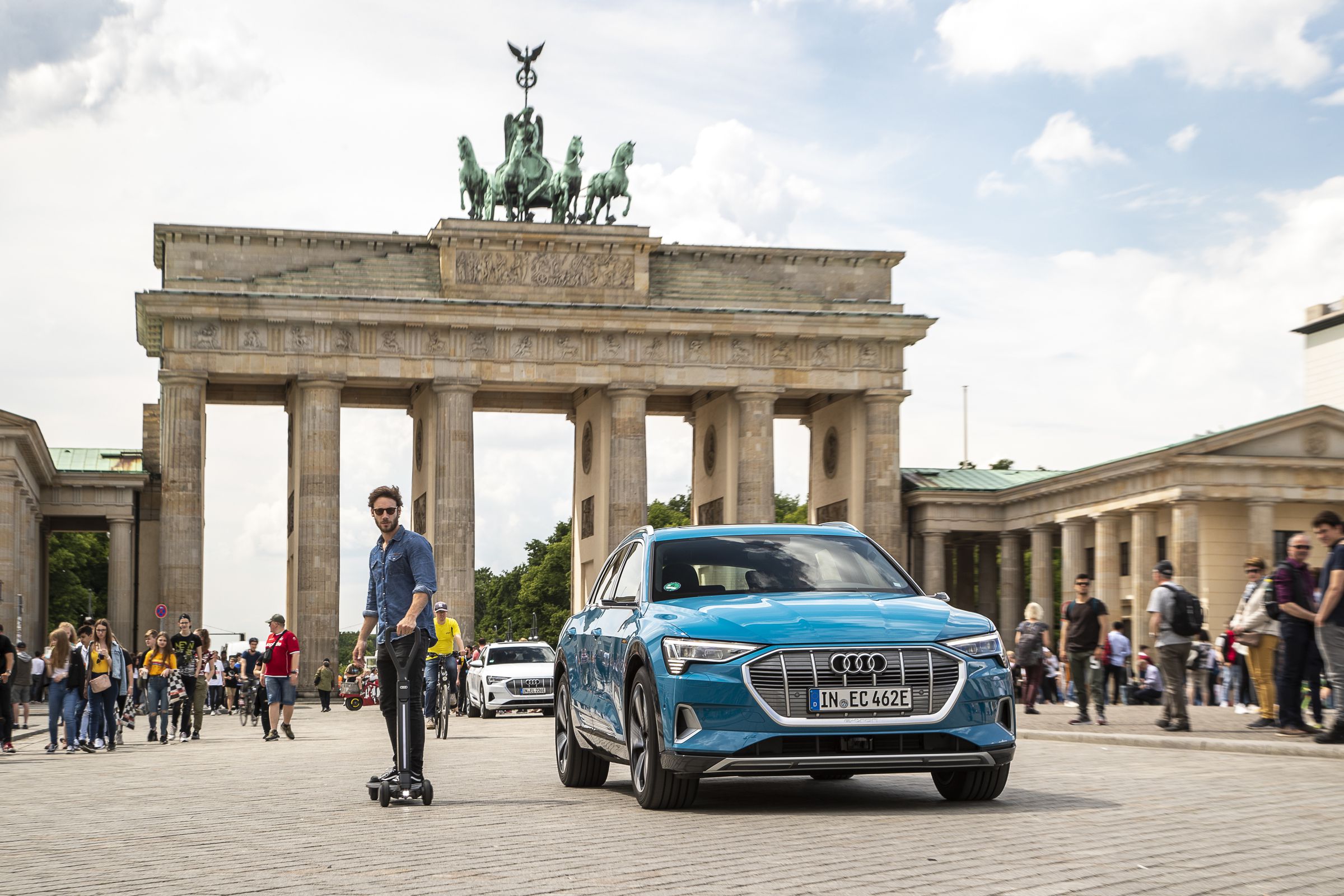 Audi says that you could charge the E-tron scooter in the trunk of your E-tron car.