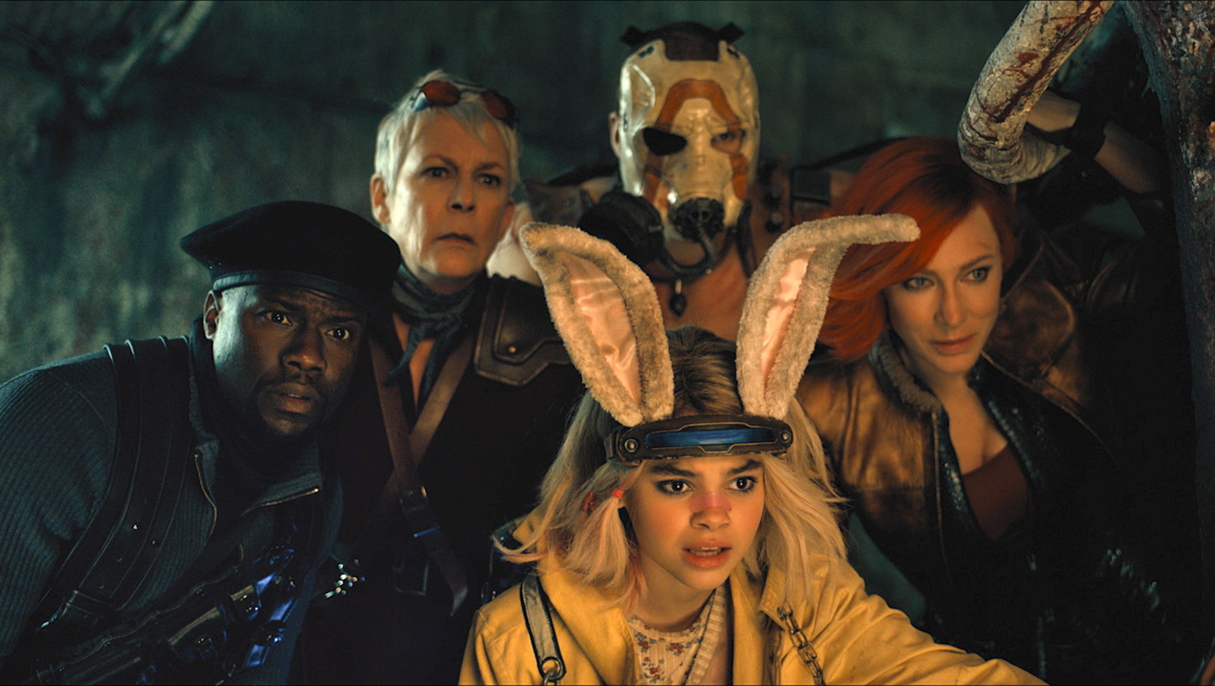 Production still from the Borderlands movie featuring Kevin Hart as Roland, Jamie Lee Curtis as Tannis, Ariana Greenblatt as Tiny Tina, Florian Munteanu as Krieg, and Cate Blanchett as Lilith.