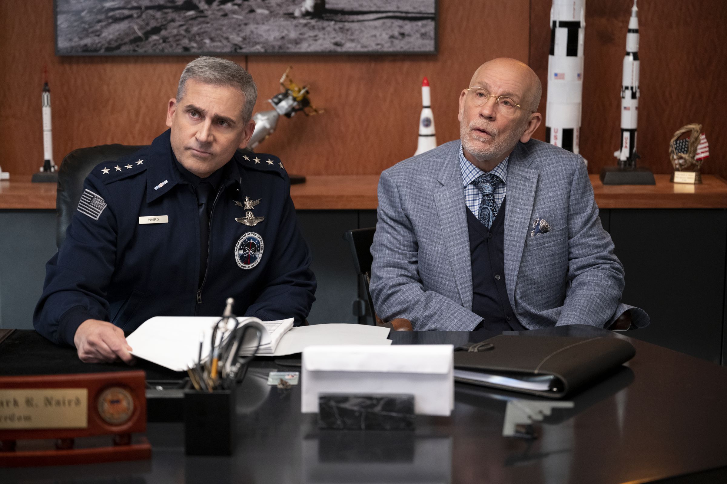 Steve Carell as General Mark Naird, John Malkovich as Dr. Adrian Mallory in Space Force.