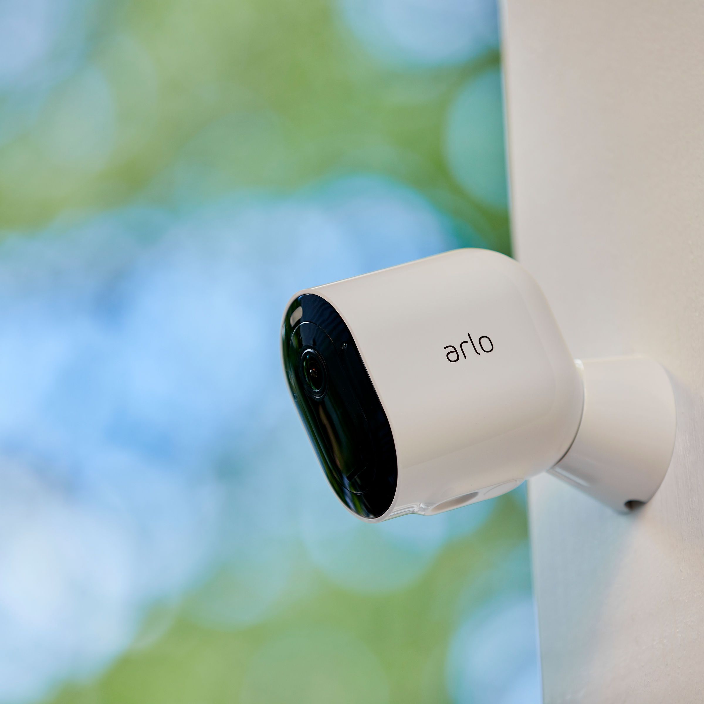 The Arlo Pro 4 mounted outdoors.