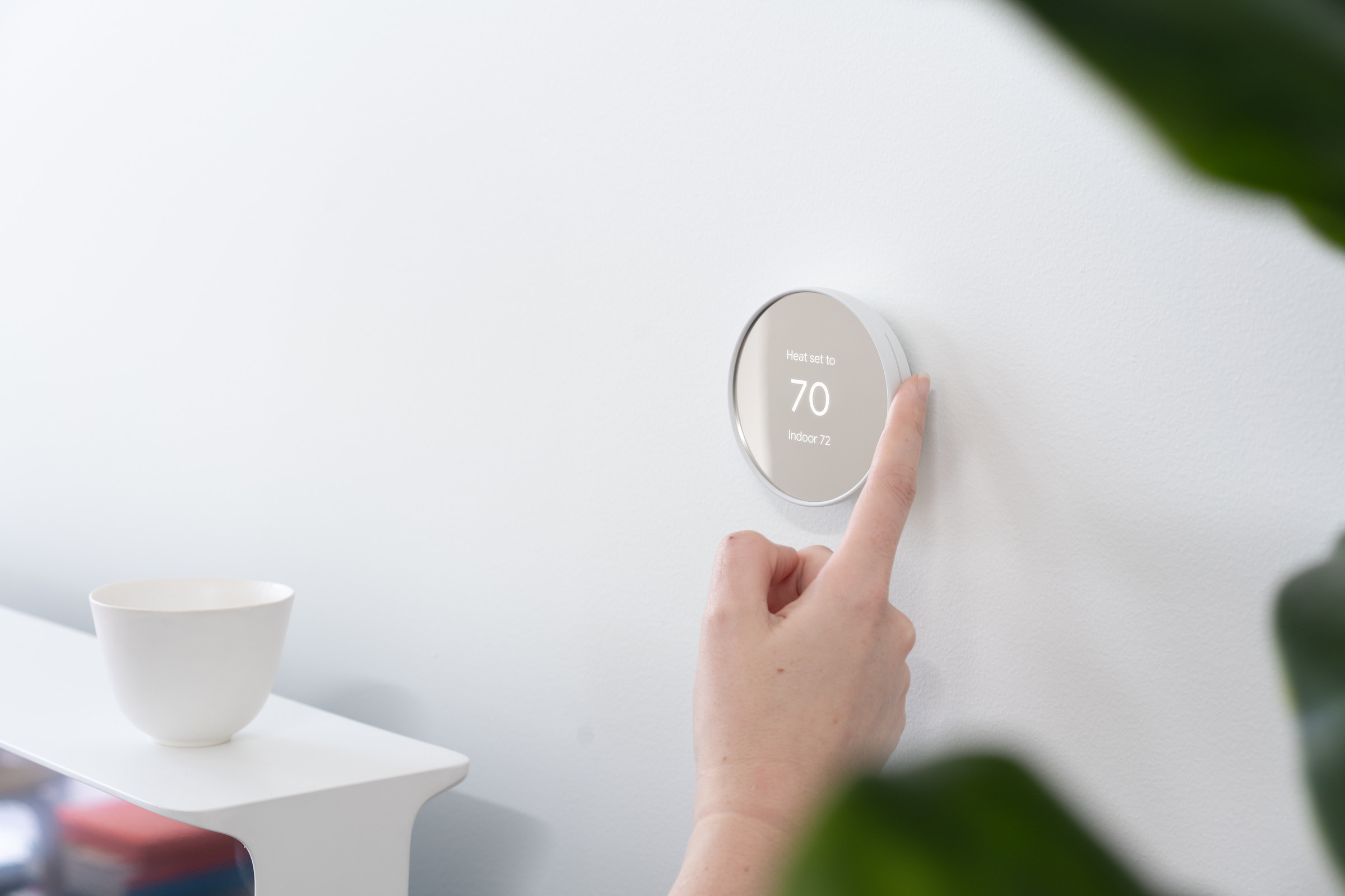 The new Nest Thermostat ditches the traditional rotating dial for a simpler, touch strip control system