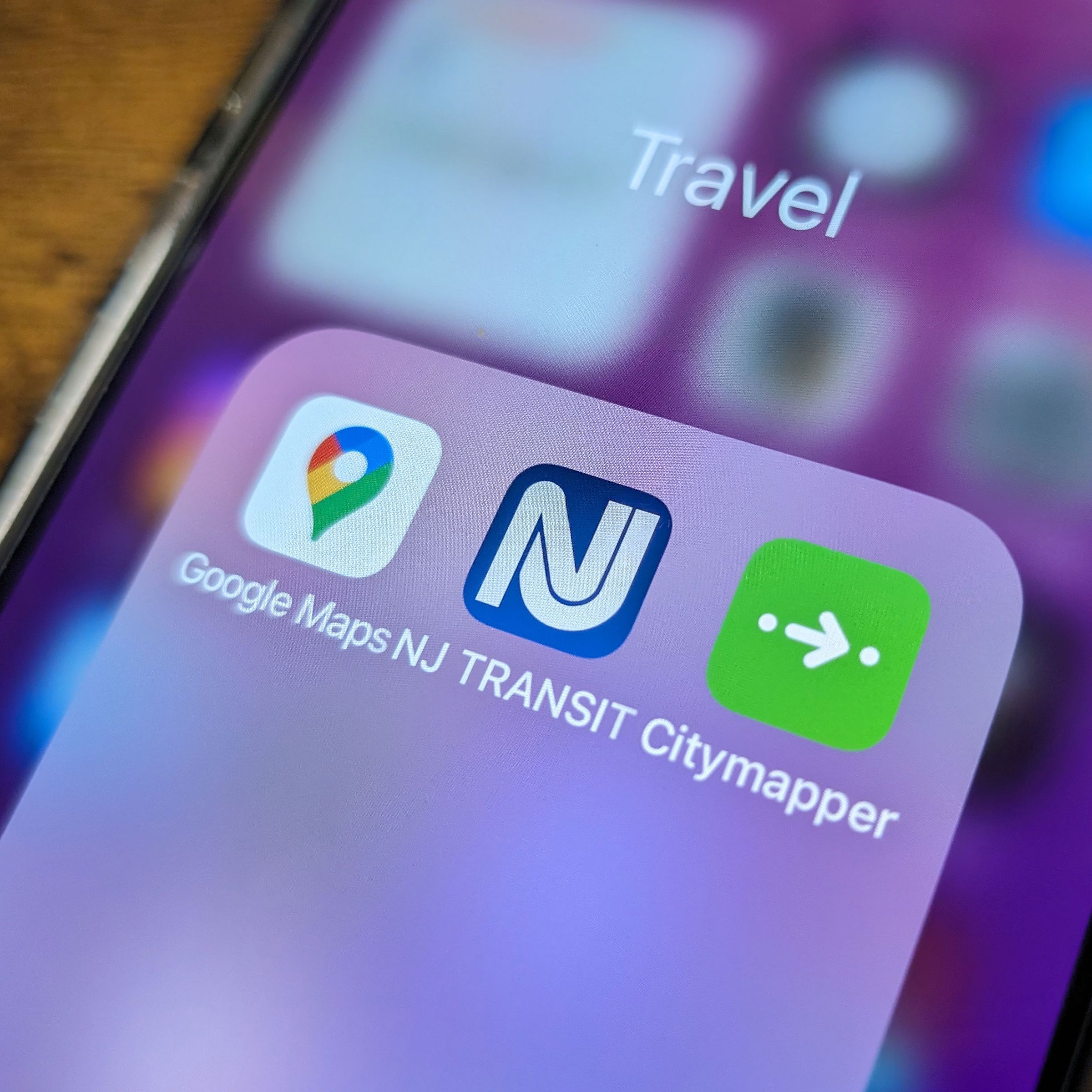 Close up of NJ Transit app, Citymapper, and Google Maps