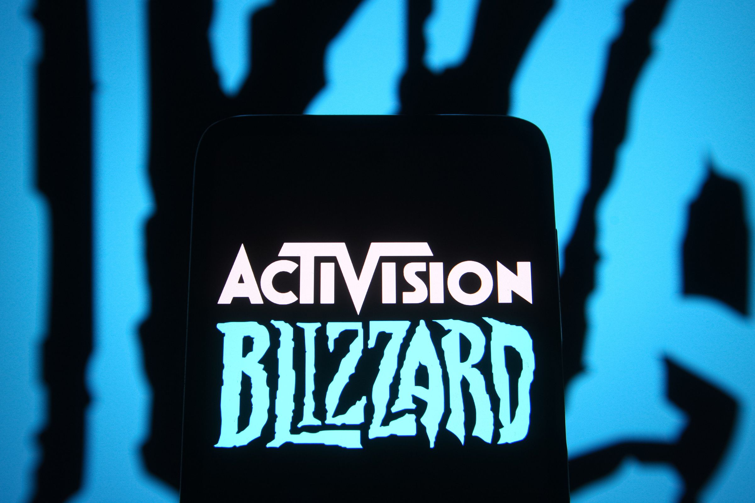 In this photo illustration, Activision Blizzard logo of a...
