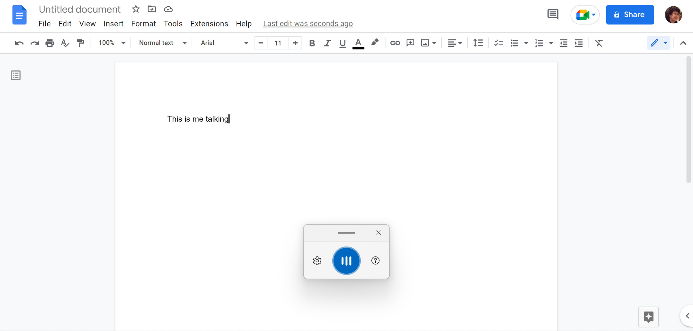 Writing in a Google Doc with Windows’ Voice Typing.