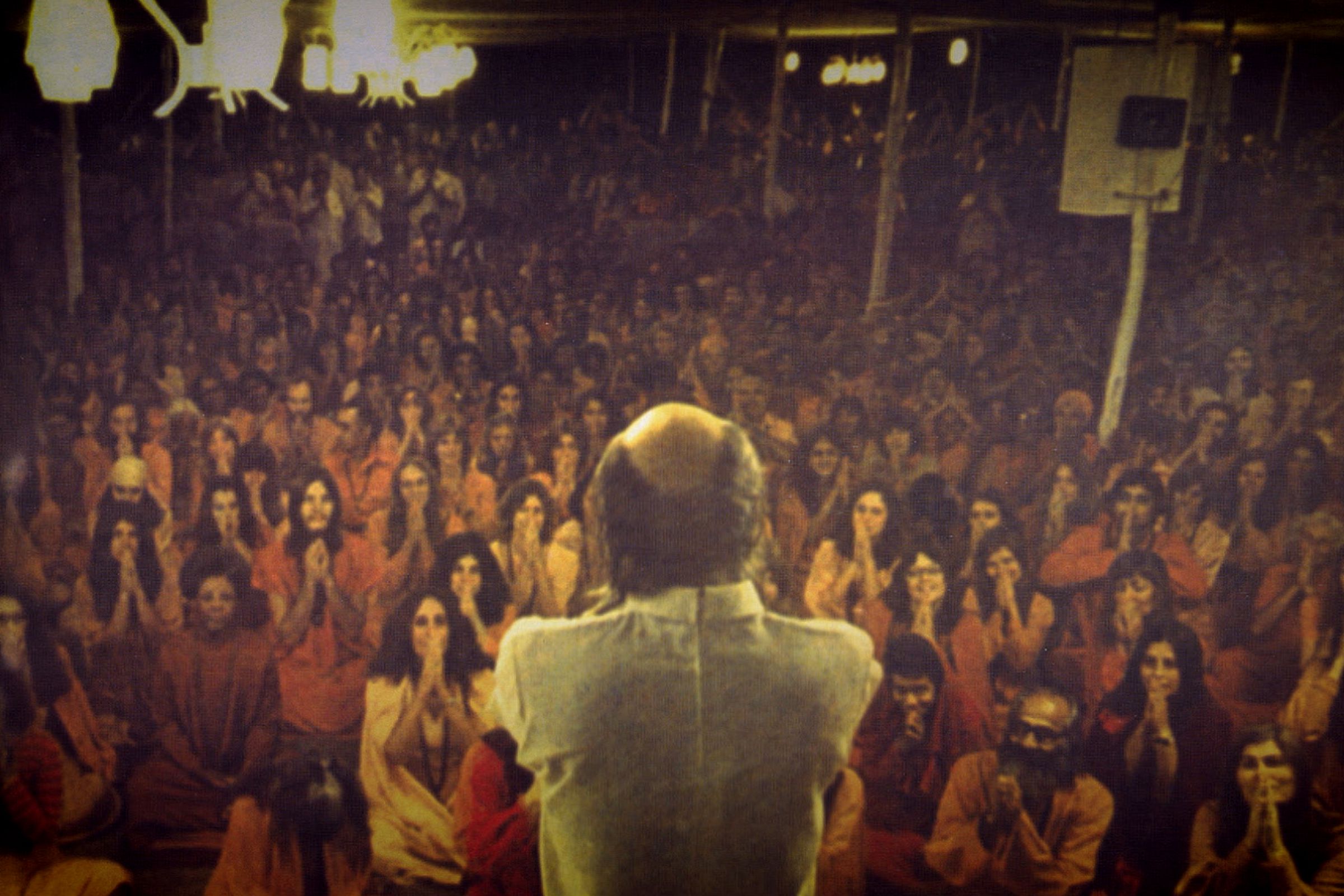Cult leader Bhagwan Shree Rajneesh and his followers in India.