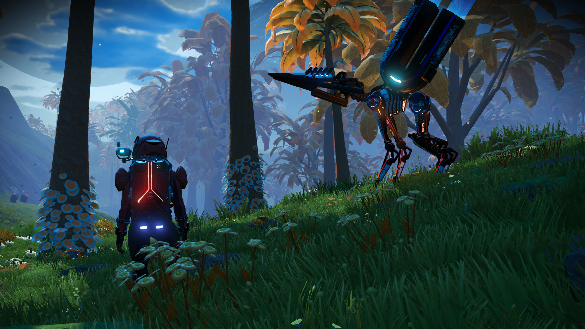 A screenshot of an alien planet with lush grass and mechanical-looking aliens.