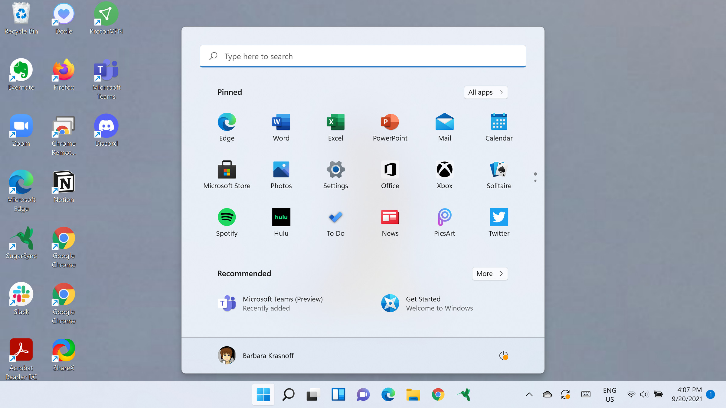 The Windows 11 Start menu is now a small icon in the center of the taskbar.