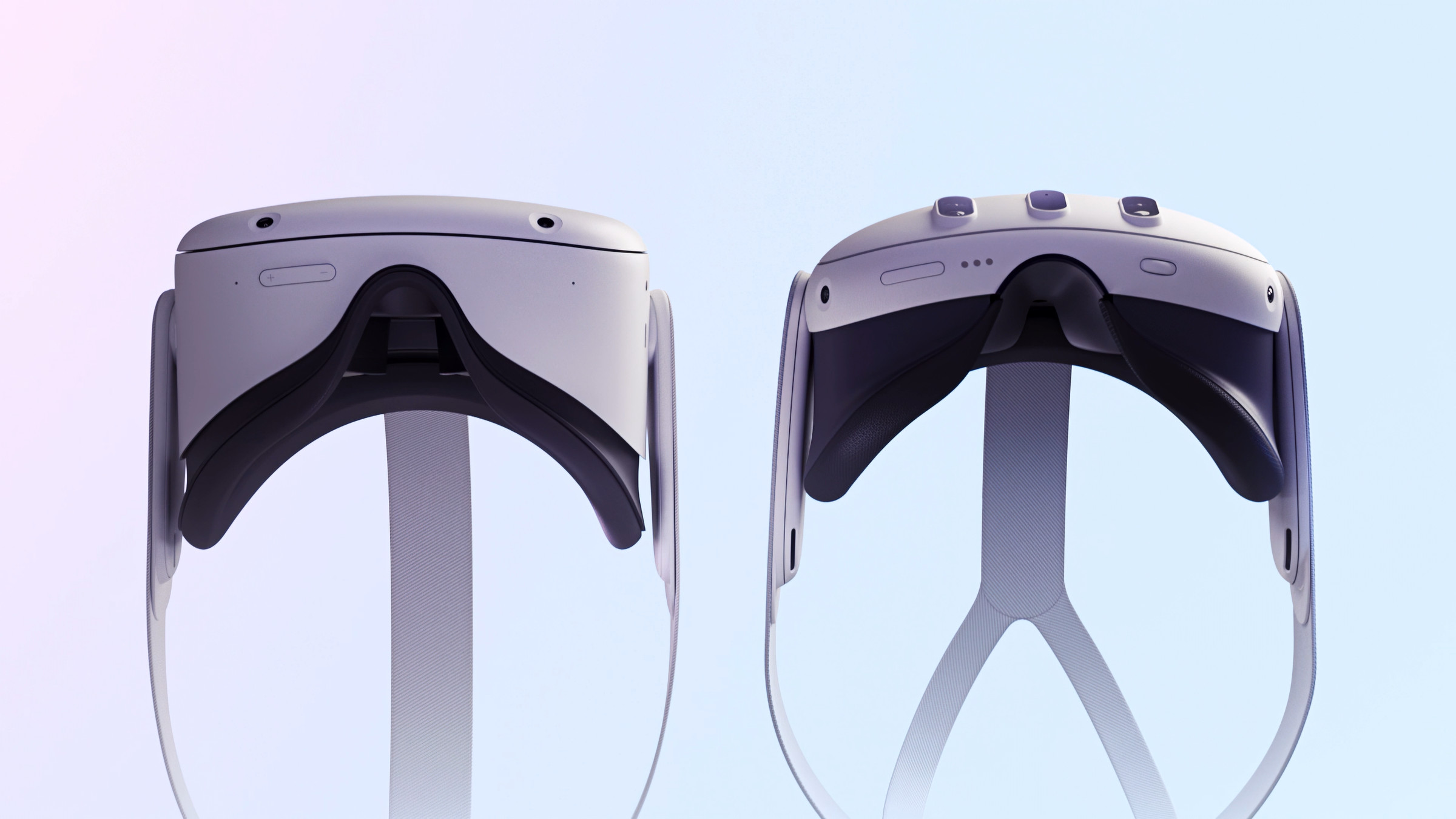 Side-by-side view from the bottom of both the Meta Quest 2 and Quest 3 headsets showing the new version’s slimmer design.