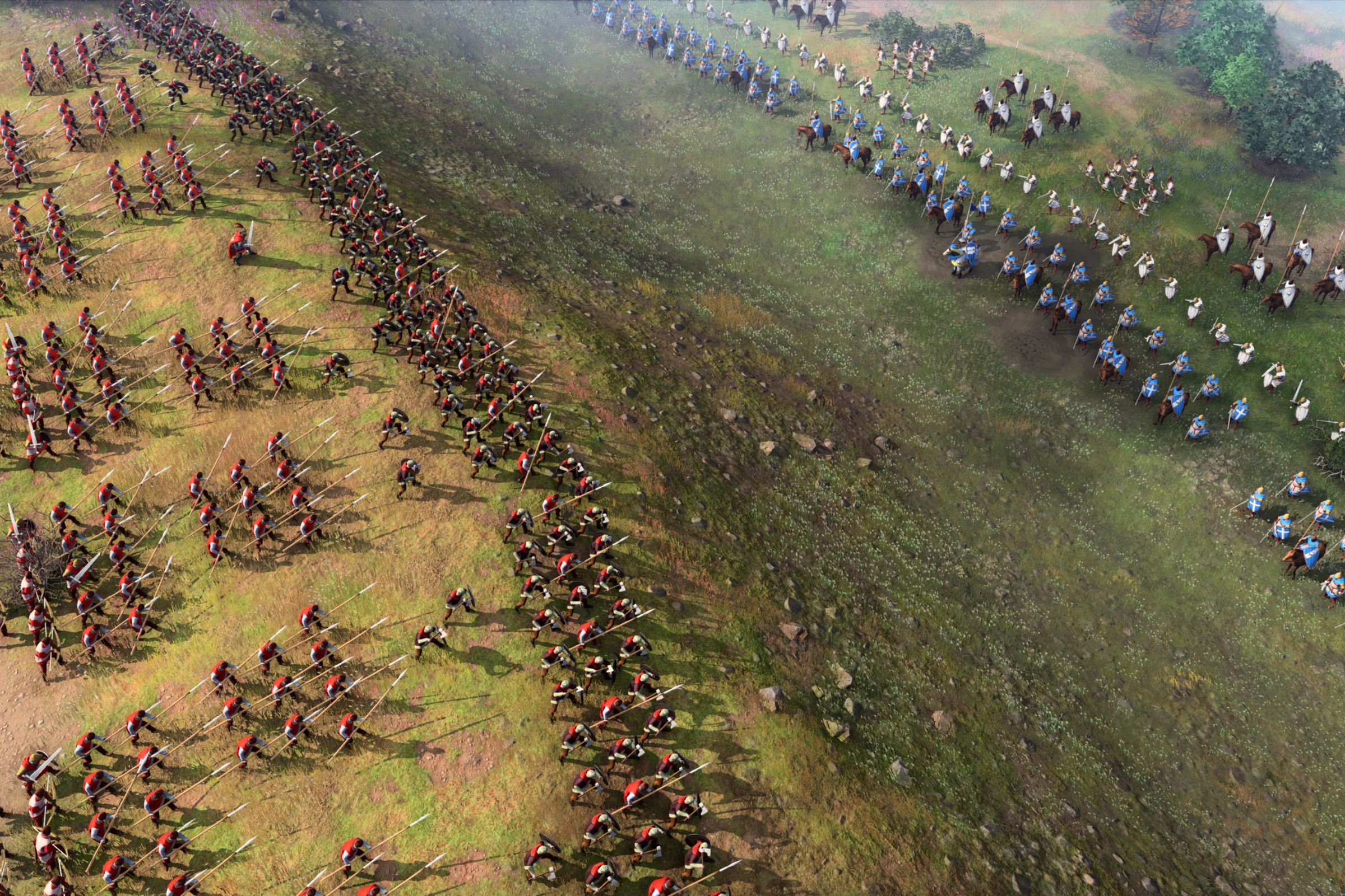 This is a scene from Age of Empires IV, showing two armies battling on a field.