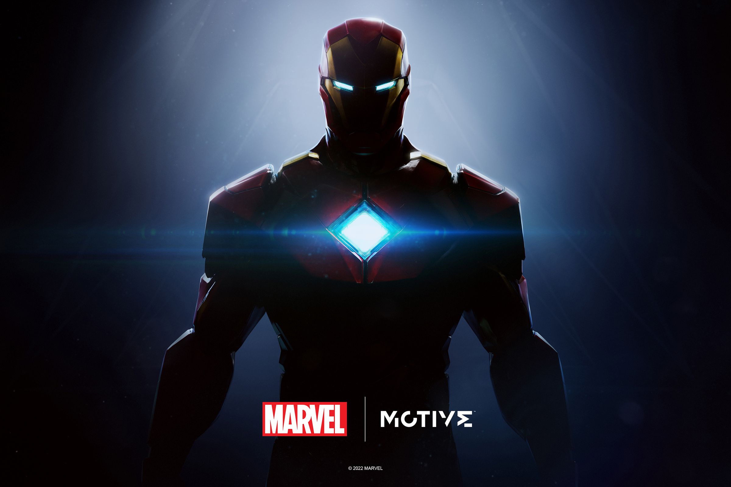 Iron Man stands before a white light. The Arc Reactor in his suit glows blue. The logos for Marvel and Motive are at the bottom of the screen.