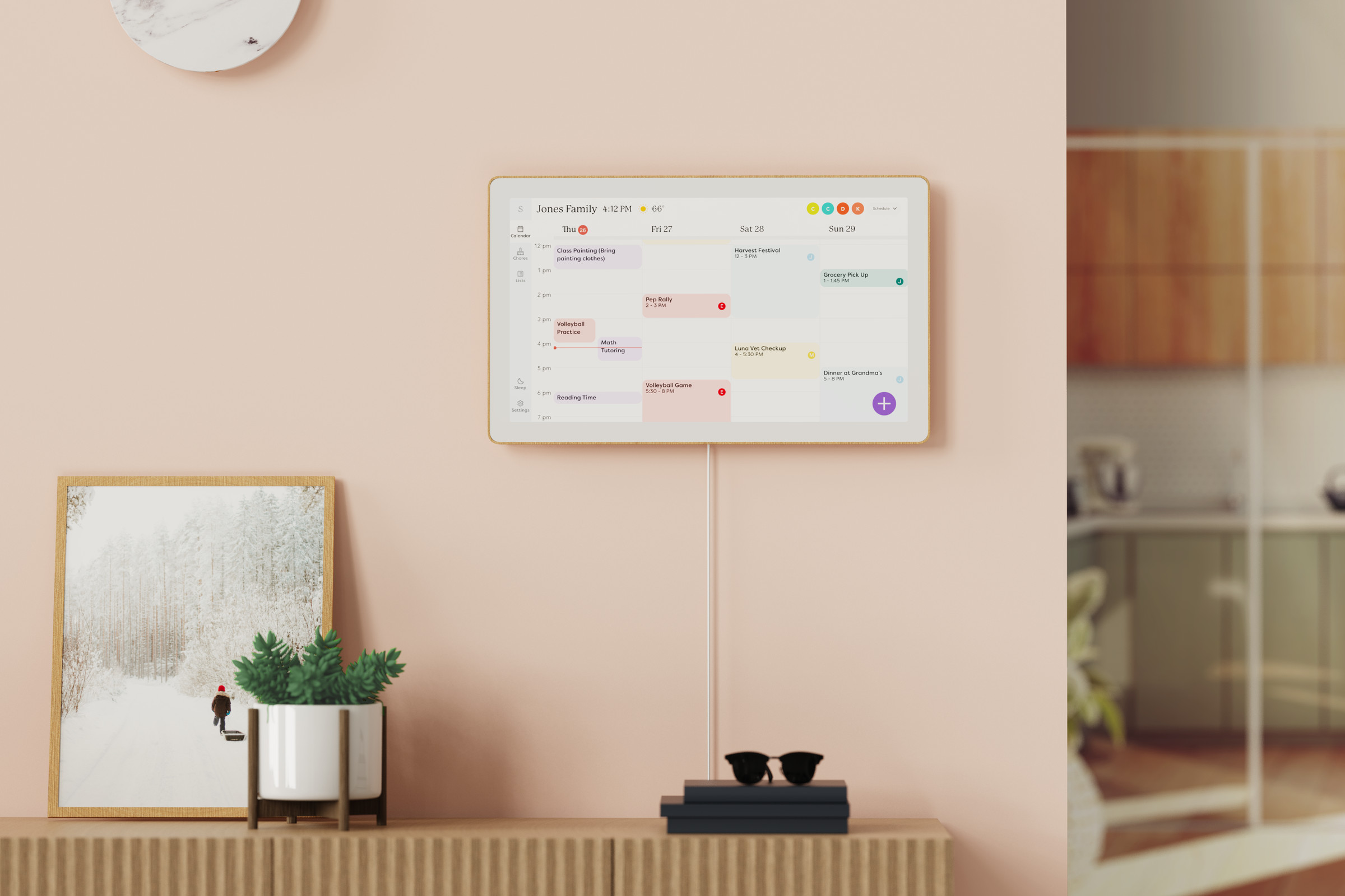 A digital calendar on a wall in a home.