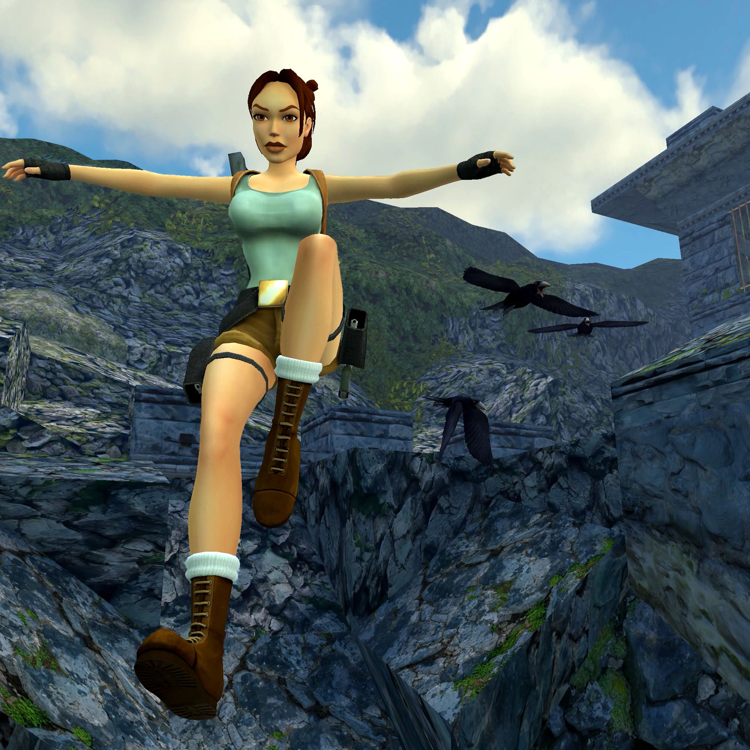 Screenshot from Tomb Raider 1-3 Remastered featuring Lara Croft jumping in the air with a mountain behind her.