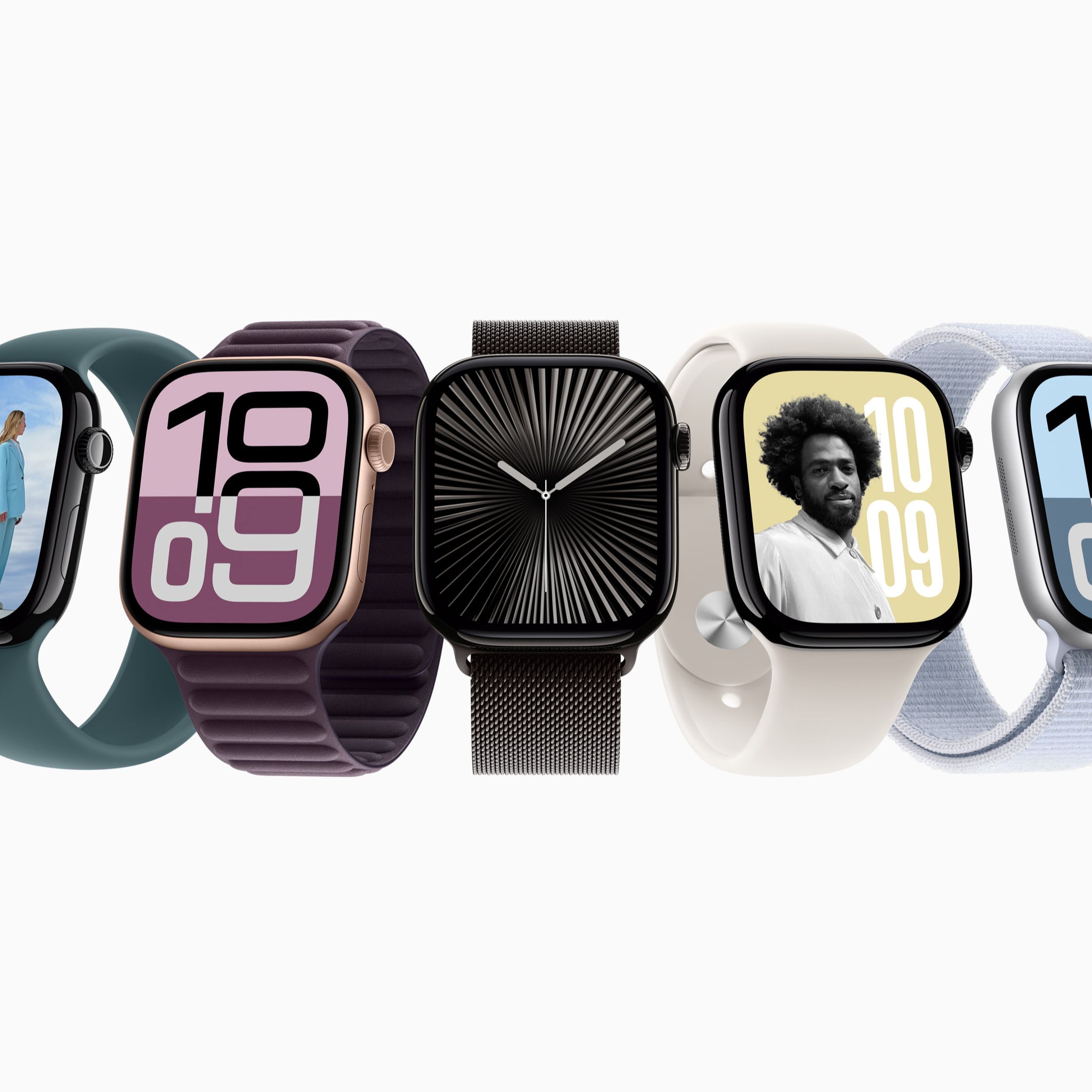 Multiple Apple smartwatches in different colors.