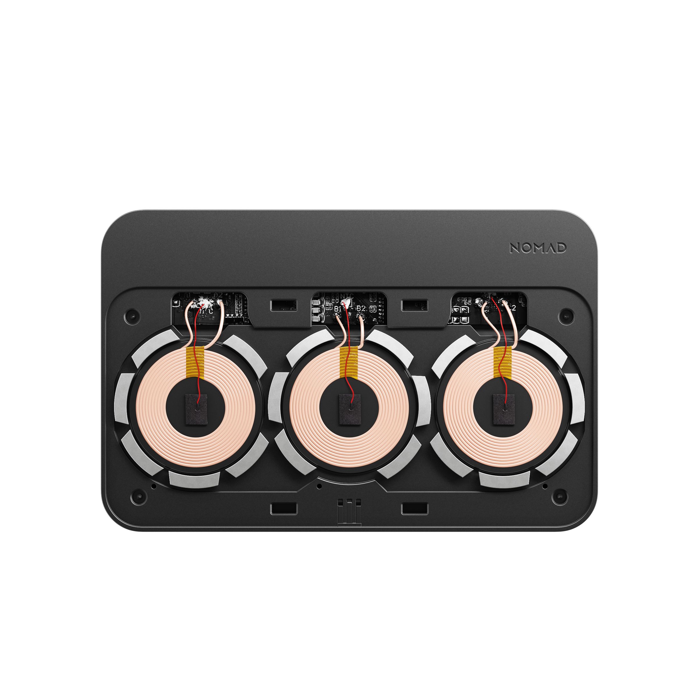Under the Base Station Hub’s leather pad are three charging coils surrounded by magnets, which help align compatible devices so they charge efficiently.