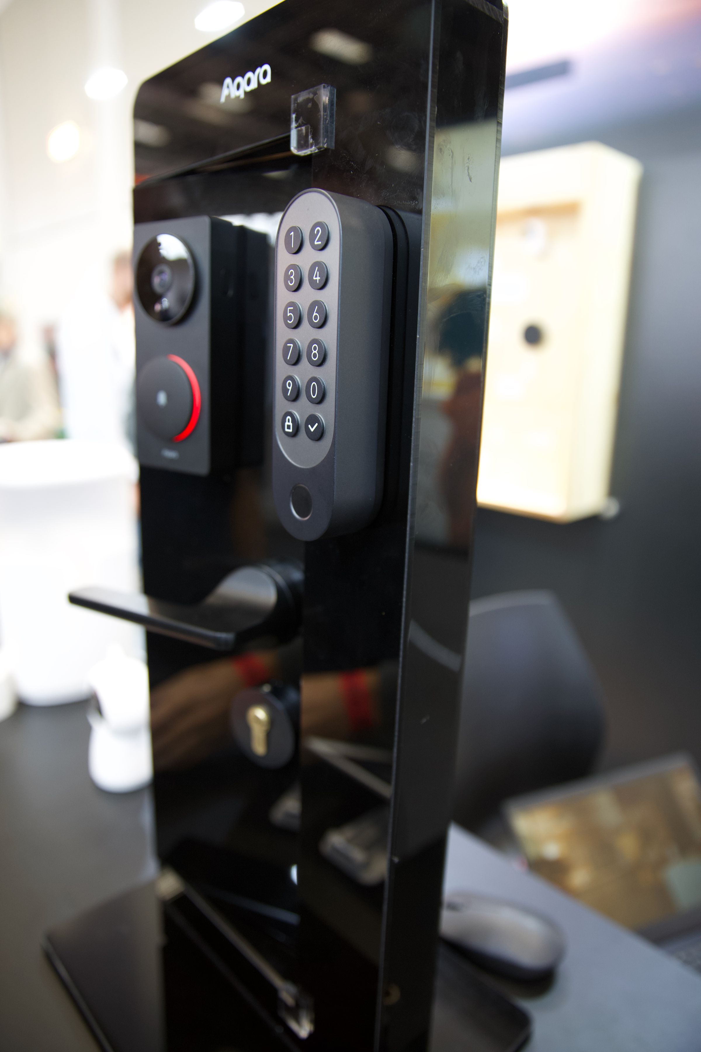 The separate Bluetooth keypad (pictured next to Aqara’s video doorbell) connects to the lock via Bluetooth.