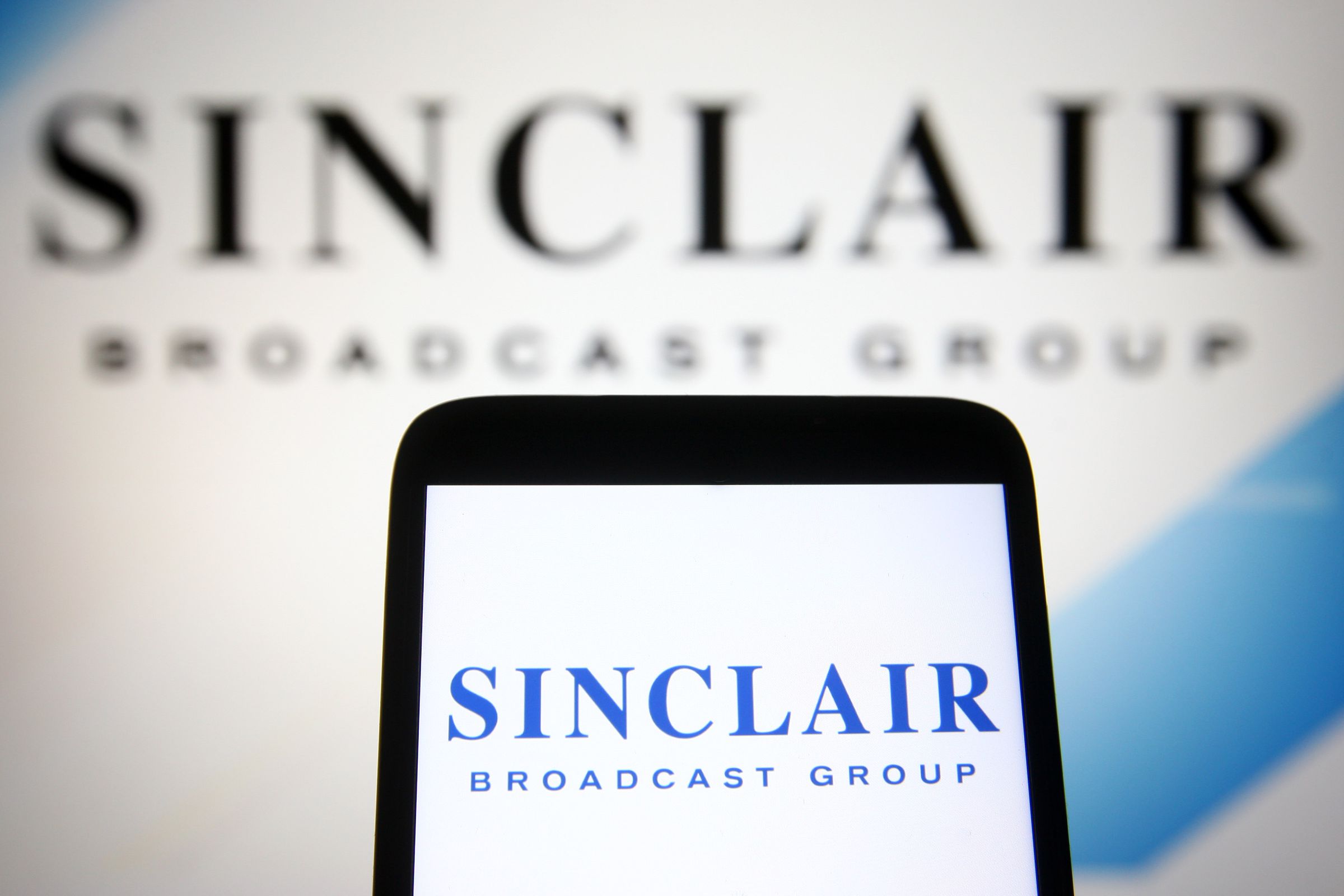 In this photo illustration a Sinclair Broadcast Group (SBG)...