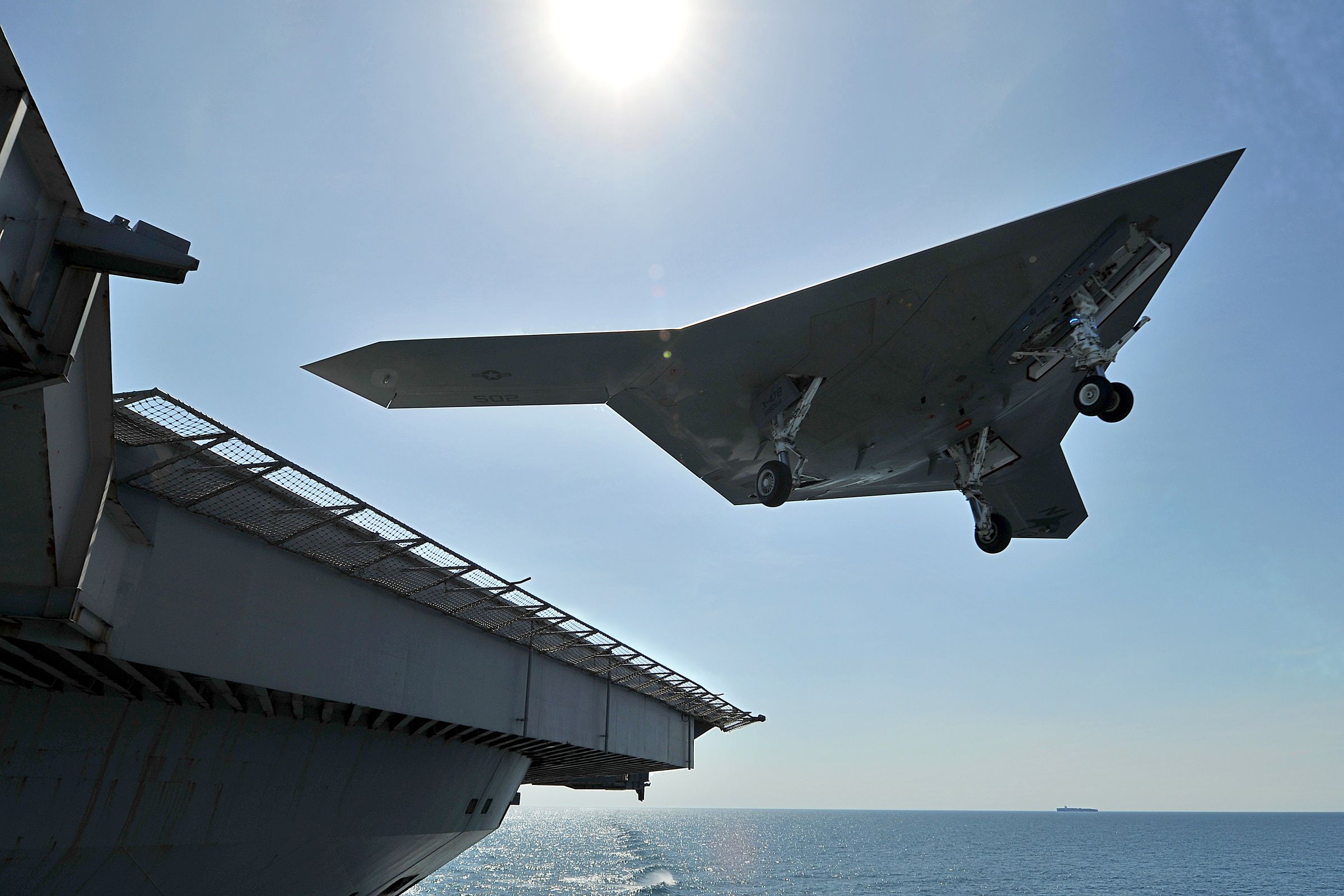 Unmanned Combat Air System Executes Touch and Go Landing On Flight Deck