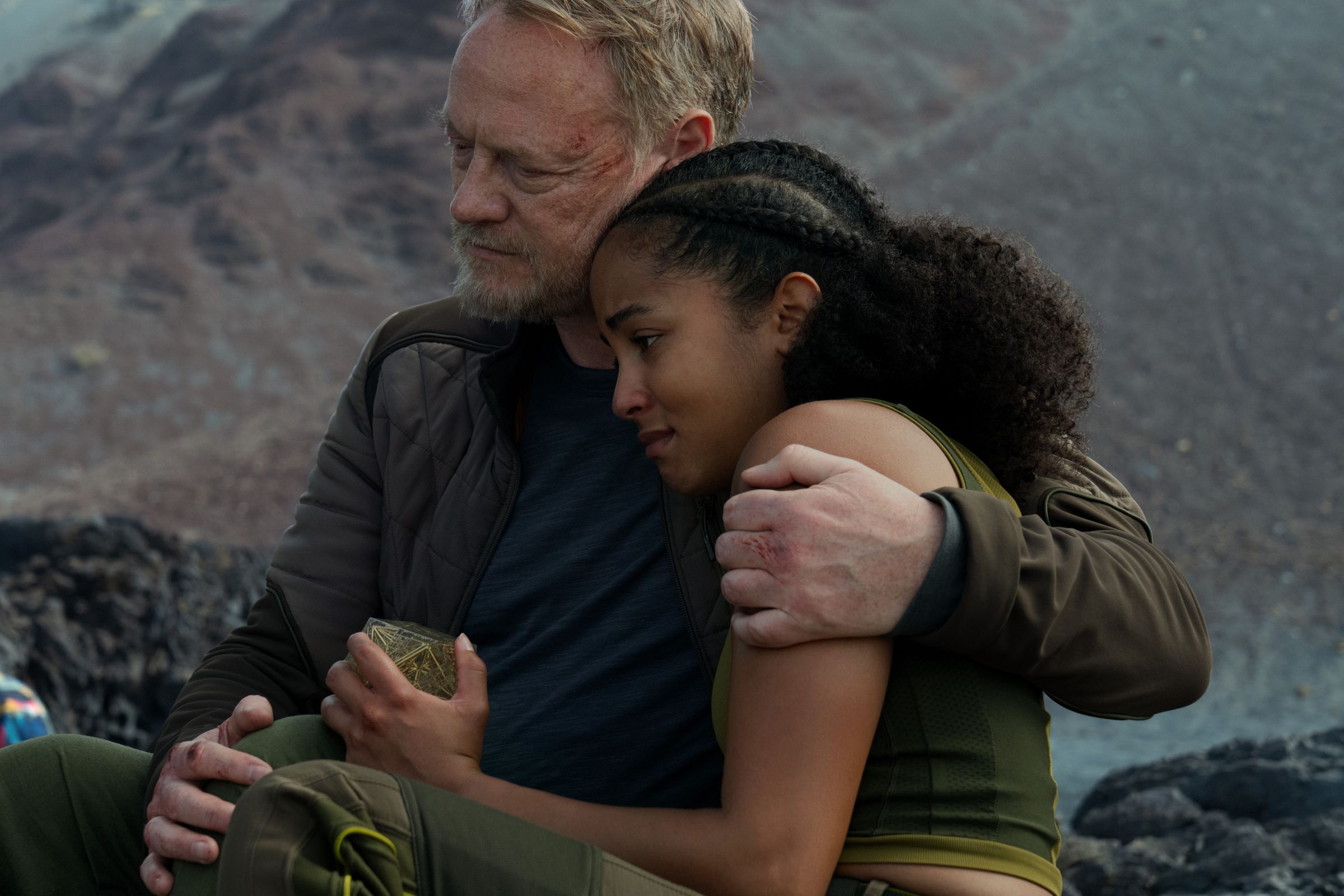 A still photo of Jared Harris and Lou Llobell from the Apple TV Plus series Foundation.