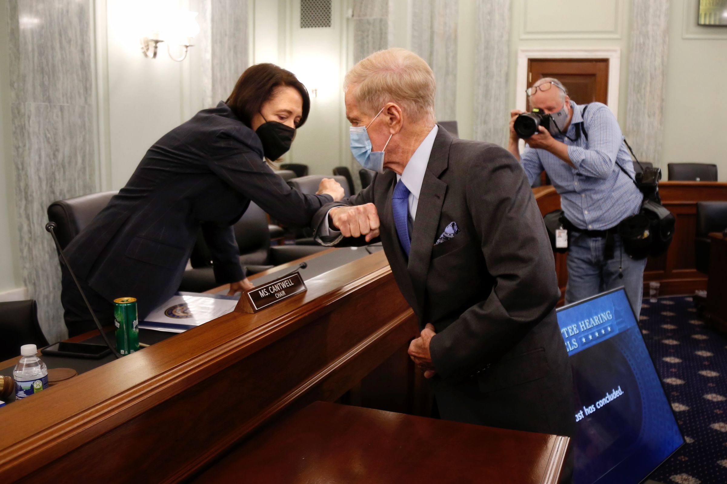 Then-nominee for NASA administrator Bill Nelson bumps elbows with Sen. Maria Cantwell, chair of the Senate commerce committee that oversees NASA, after his confirmation hearing on April 21st, 2020.