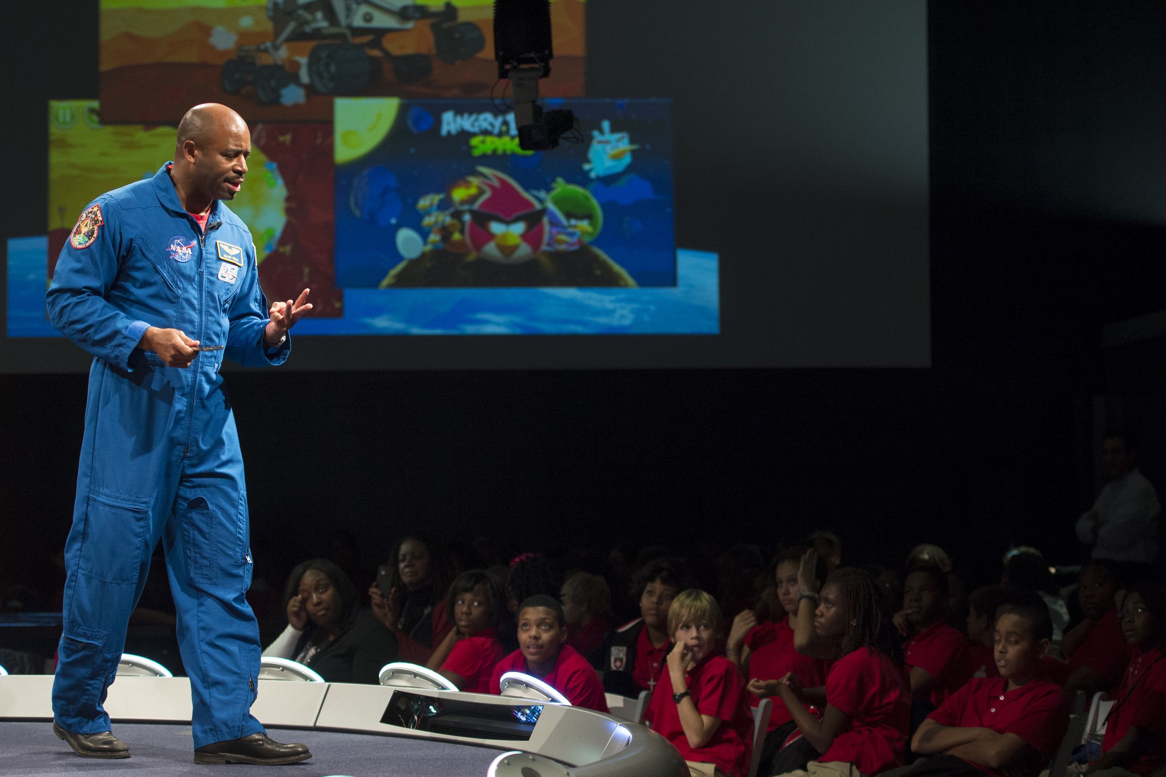 Leland Melvin, former astronaut and former associate administrator for education at NASA, talks to students at the Smithsonian National Air and Space Museum.