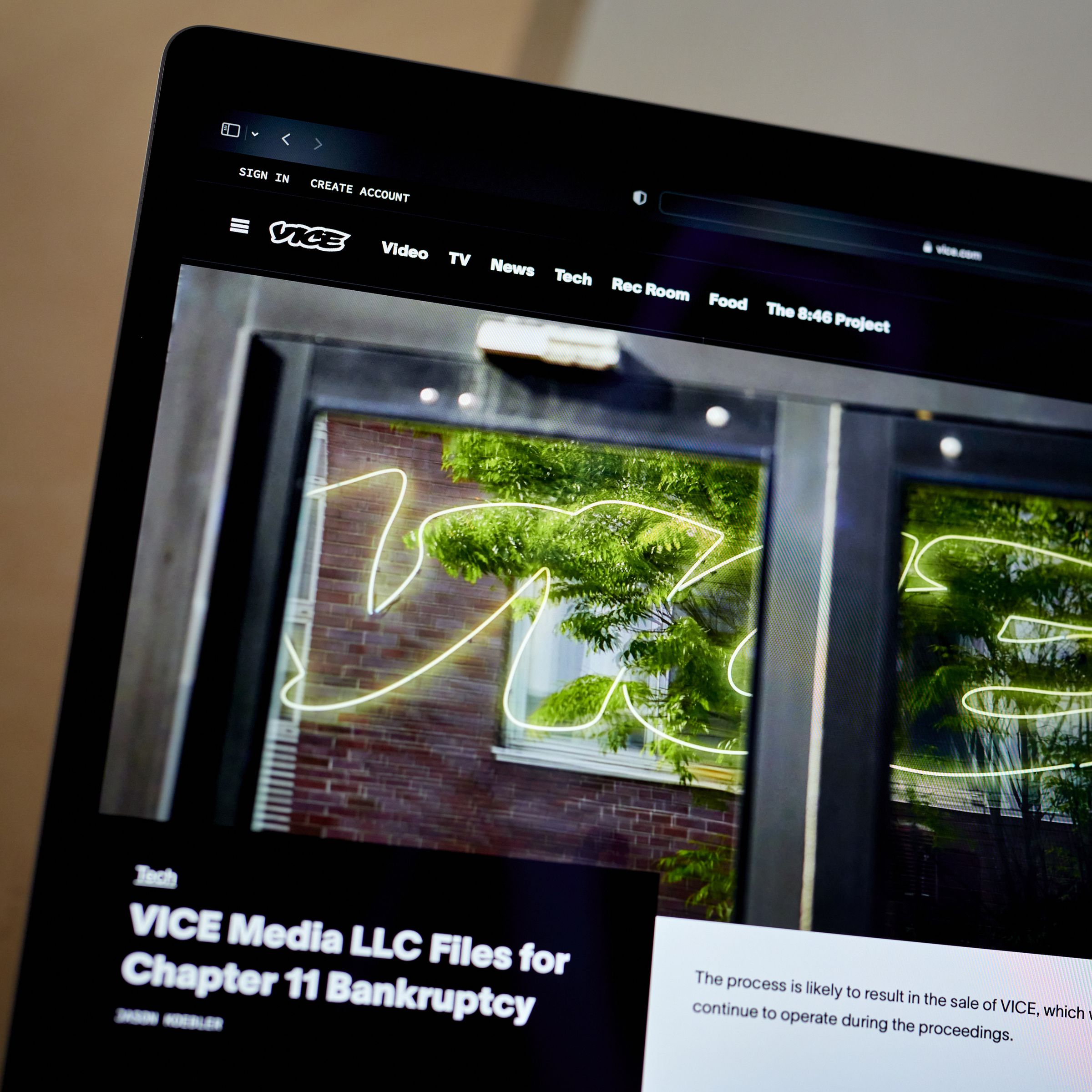 A photo showing the Vice website open on a laptop