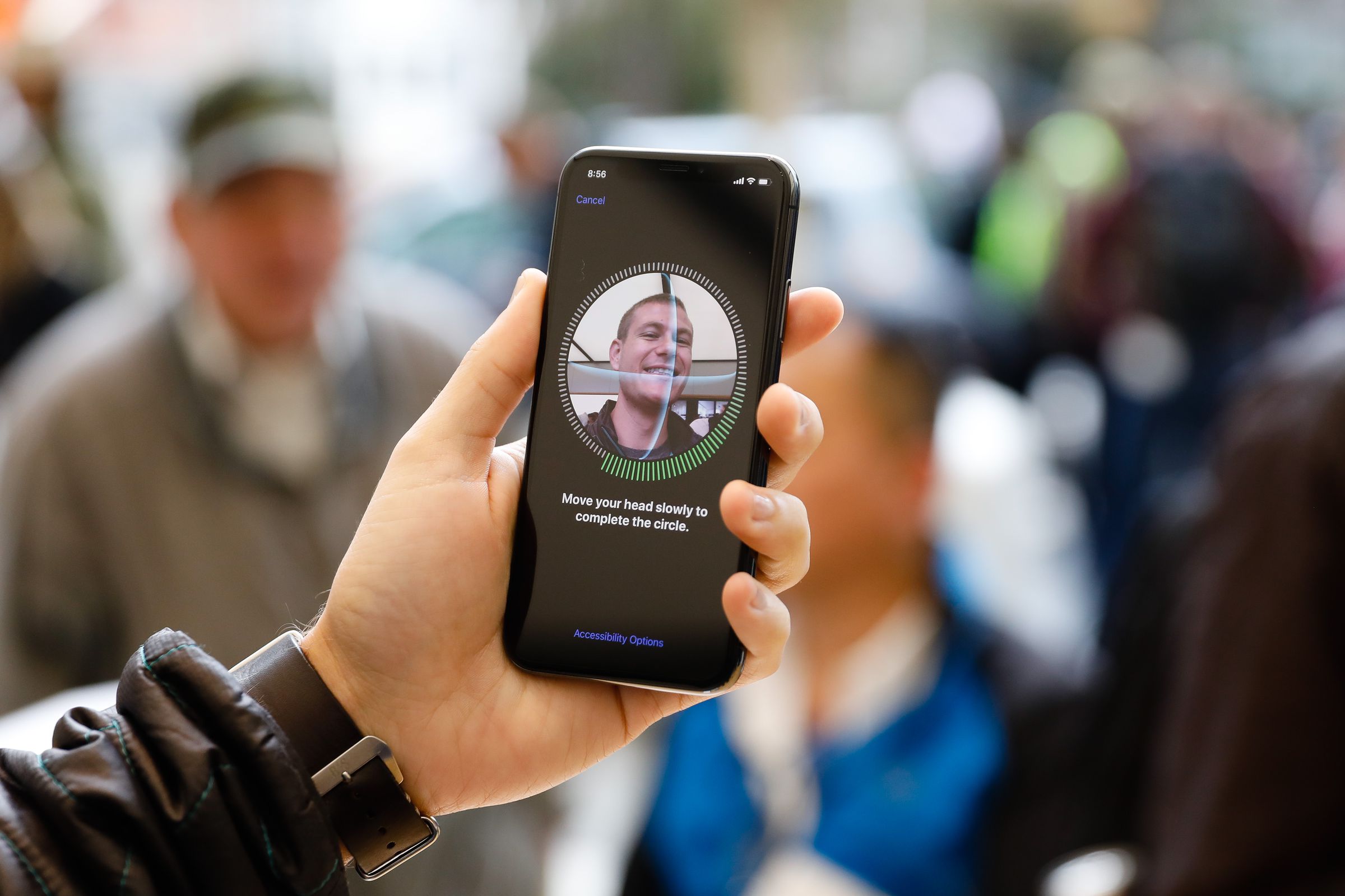 A customer sets up Face ID on his new iPhone X at the Apple Store Union Square&nbsp;