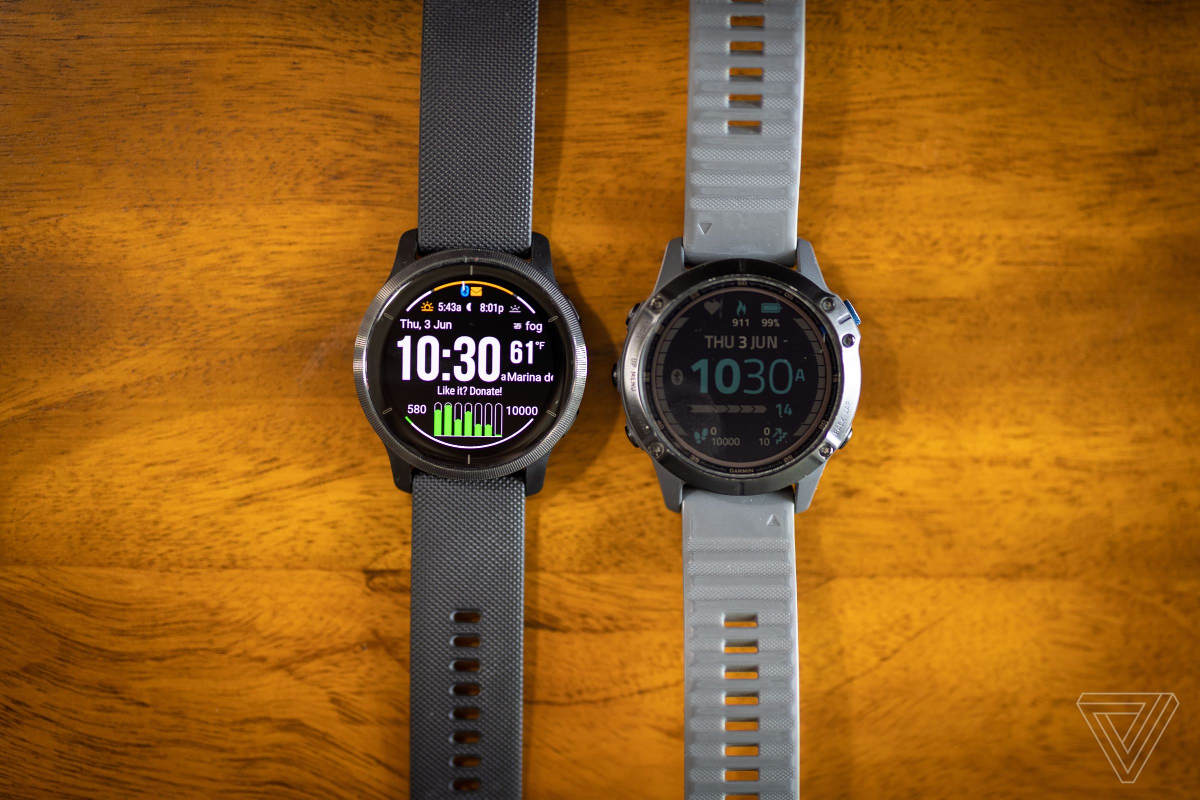 The Venu 2 is sleeker and more understated than Garmin’s other watches, such as the Fenix 6 seen here on the right.