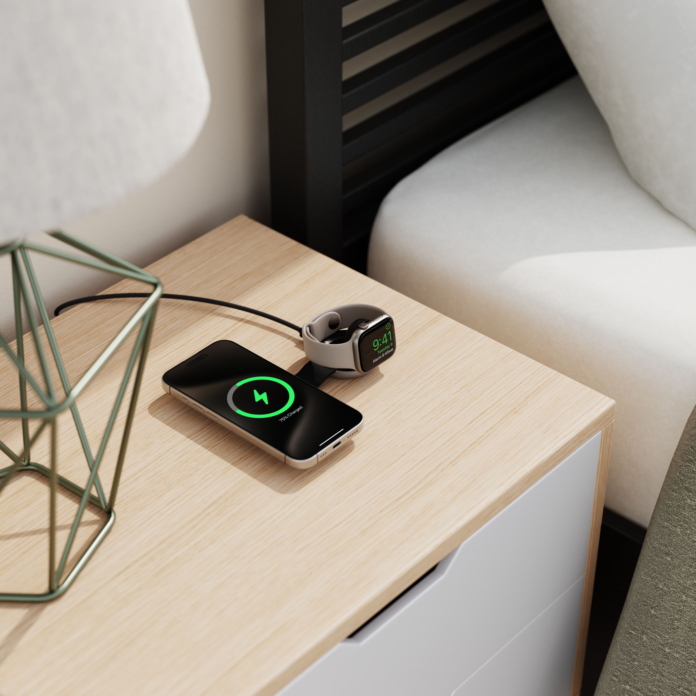 The Twelve South Butterfly MagSafe charger, charging an iPhone and an Apple Watch on a bedside table.