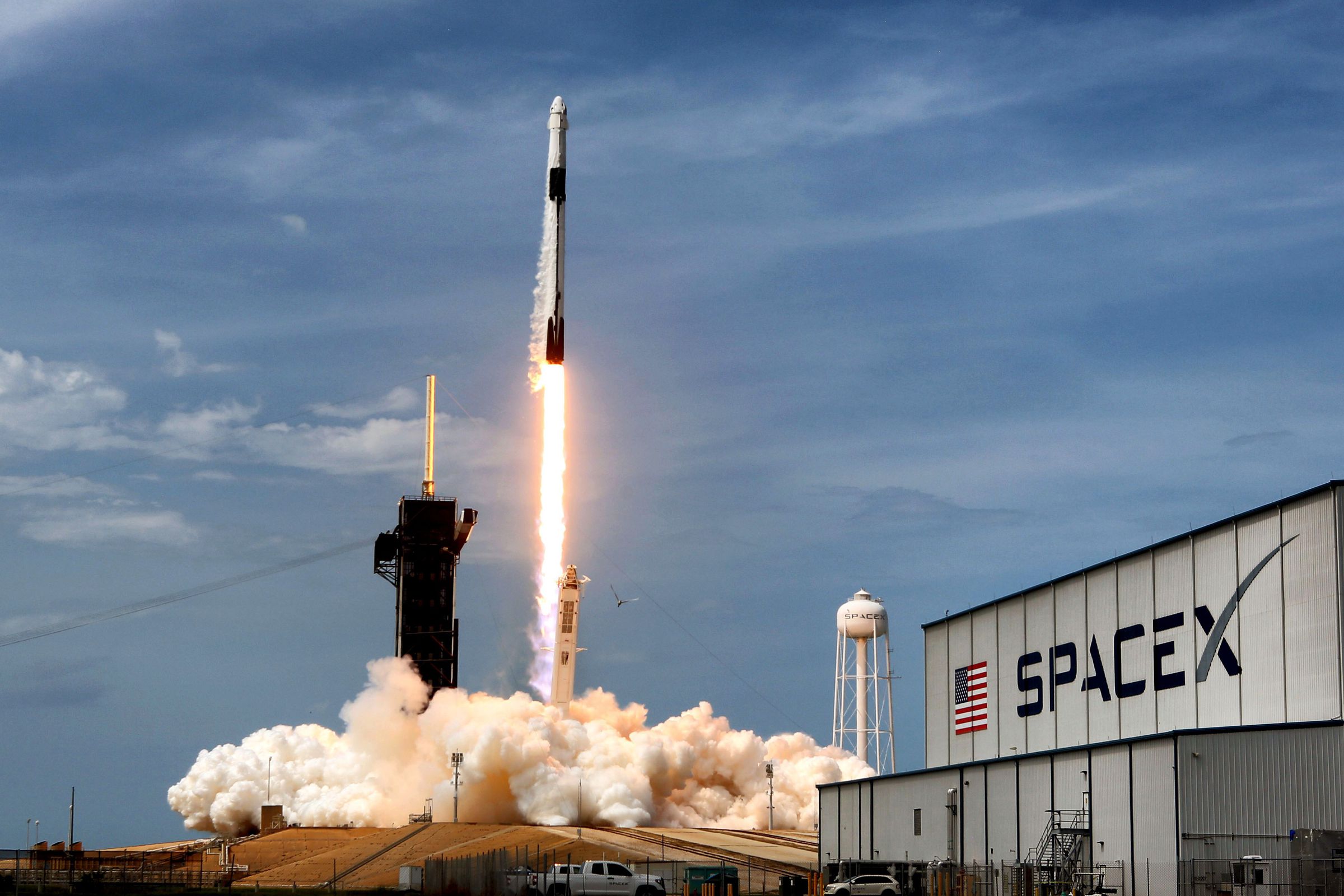 The SpaceX Falcon 9 rocket carrying astronauts Doug Hurley and Bob Behnken in the Crew Dragon capsule lifts off from Kennedy Space Center, Florida, on May 30, 2020.