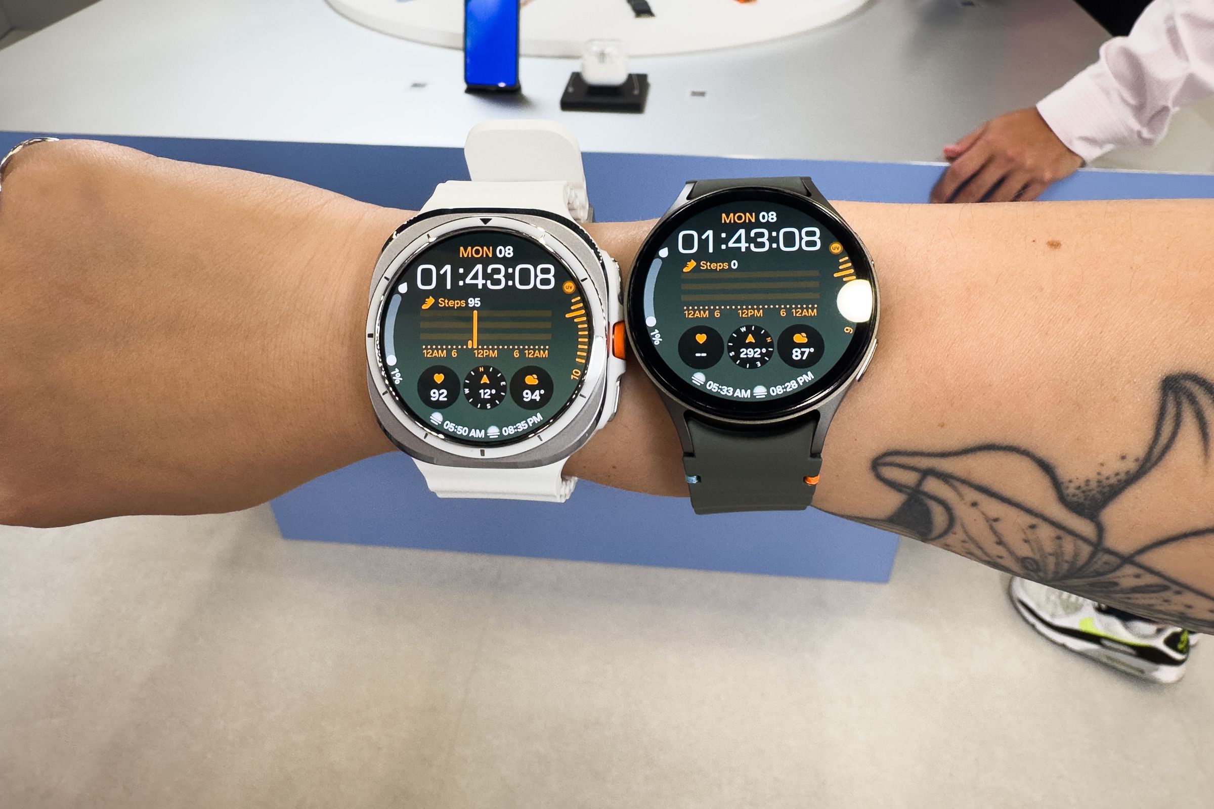 Person wearing both the Galaxy Watch Ultra and Galaxy Watch 7