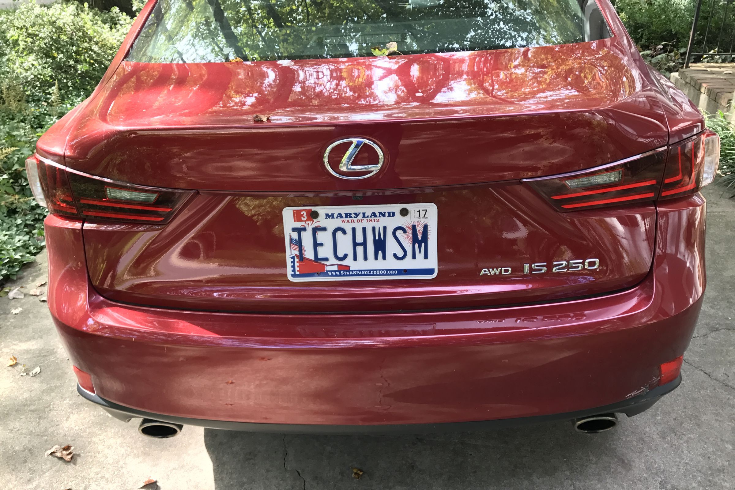 Walt’s red car with TECHWSM license plates