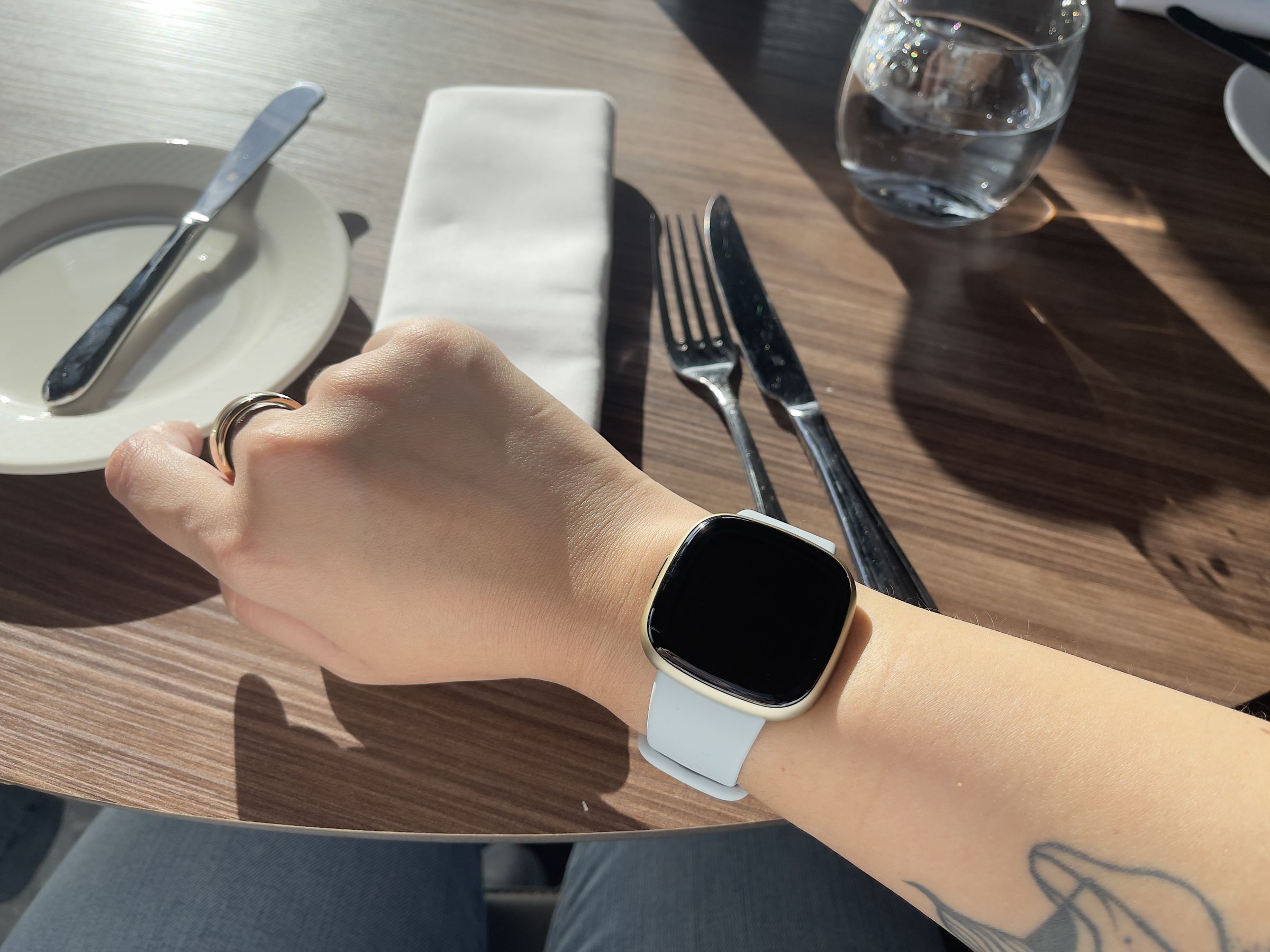 Fitbit Sense 2 without always-on display enabled worn on a wrist
