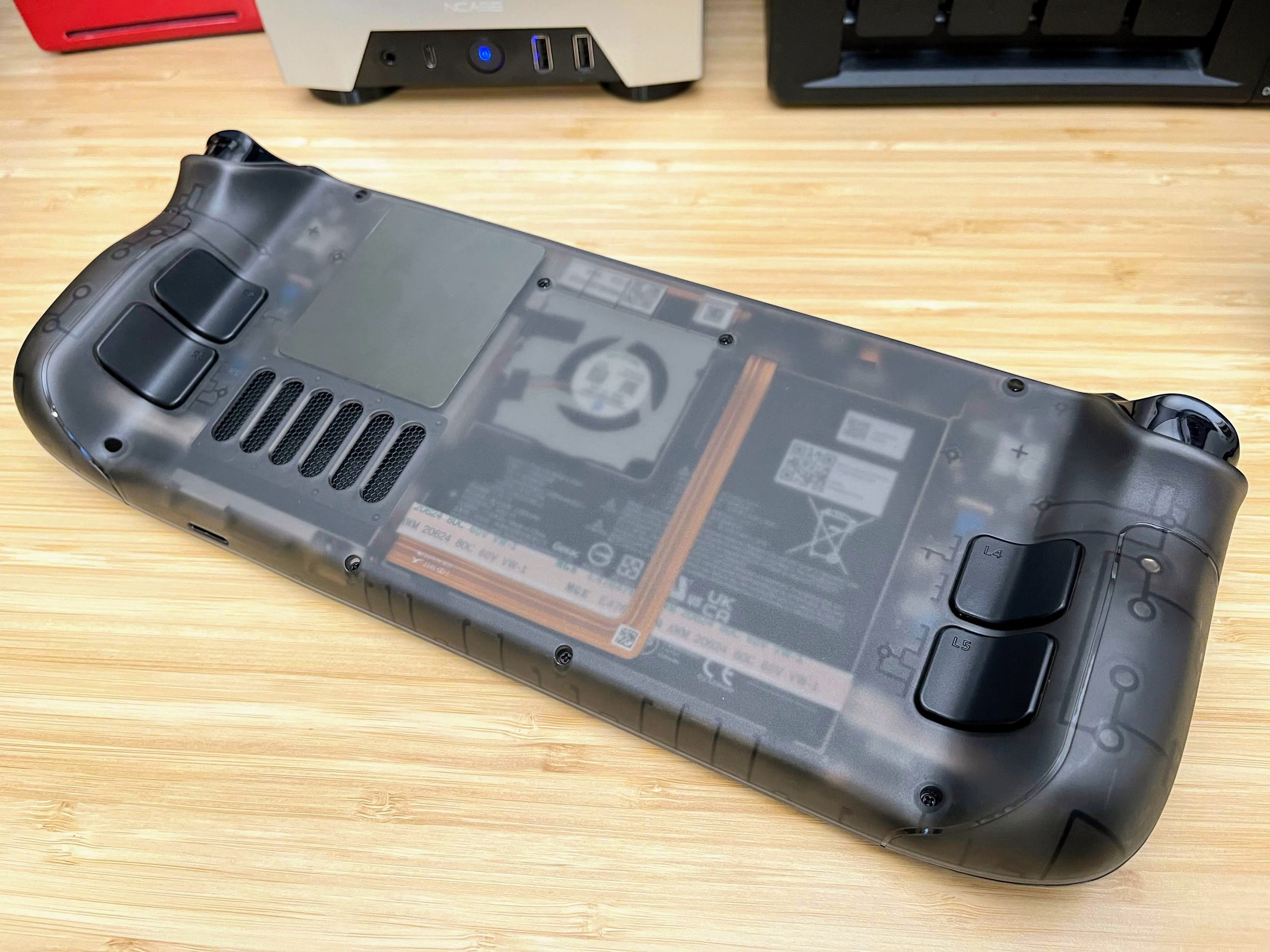 You can see the Steam Deck’s battery and fan through this transparent rear casing.