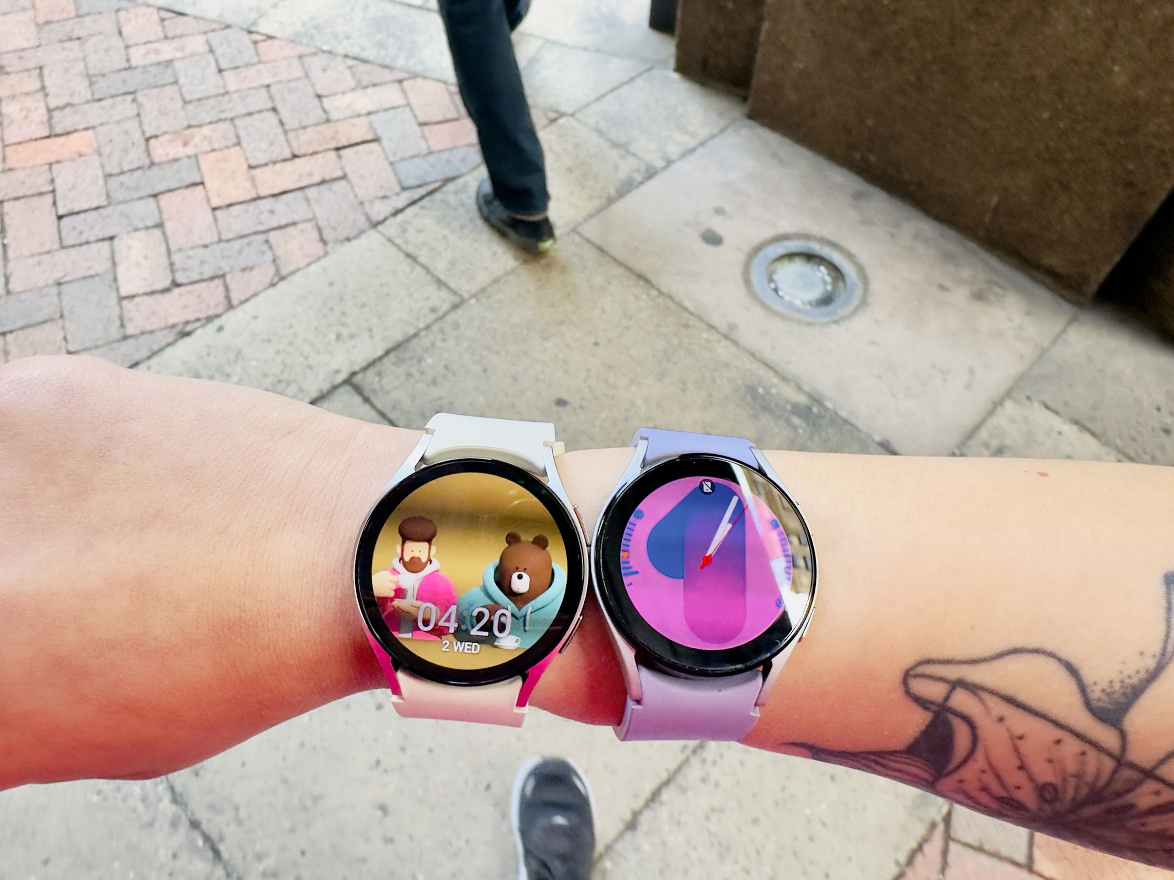Galaxy Watch 6 (40mm) next to the Galaxy Watch 5, where the former looks bigger despite being the same size