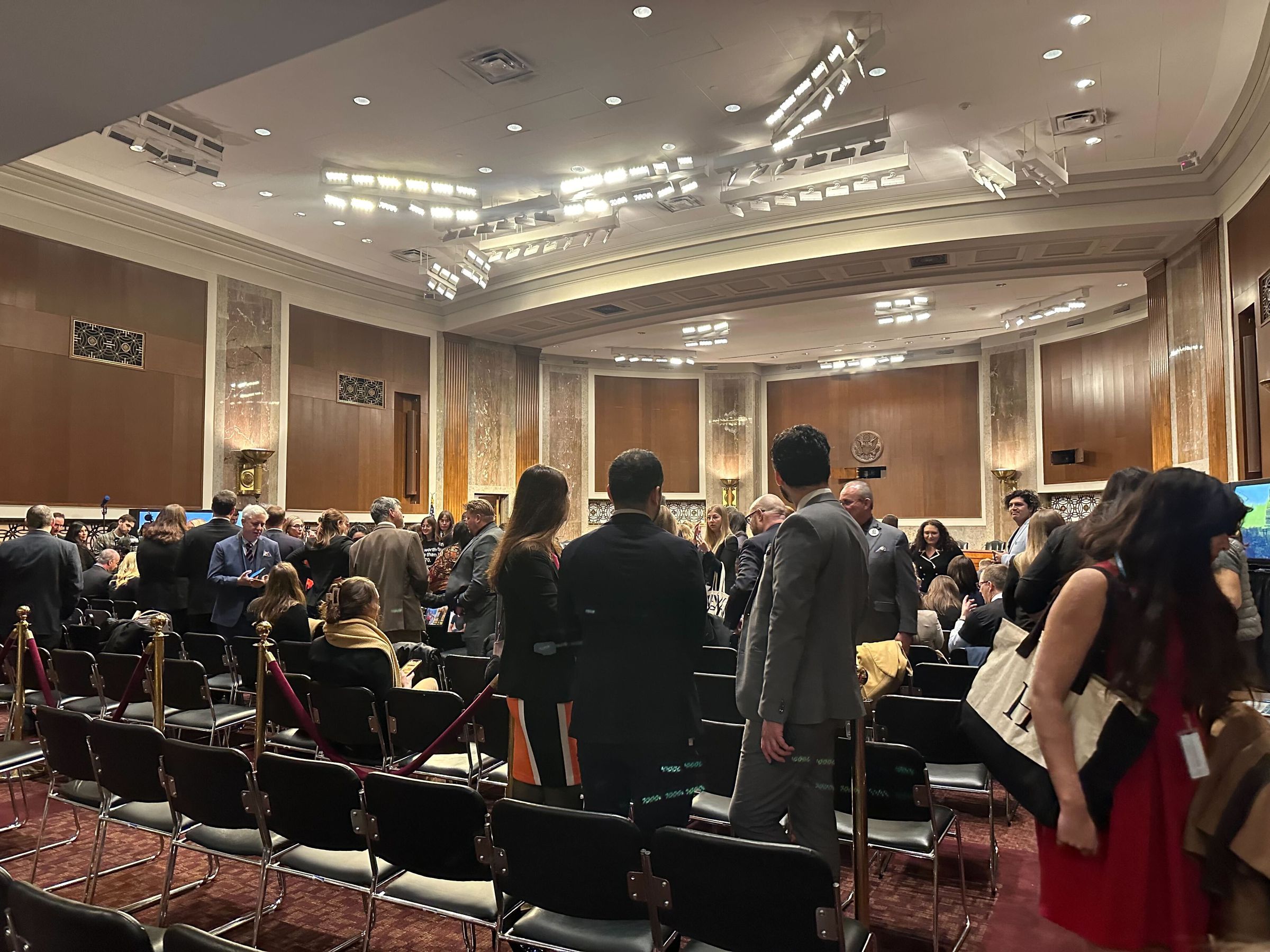 Hearing room on Capitol Hill filled with people awaiting the testimony of five tech CEOs: X’s Linda Yaccarino, TikTok’s Shou Zi Chew, Snap’s Evan Spiegel, Meta’s Mark Zuckerberg, and Discord’s Jason Citron.