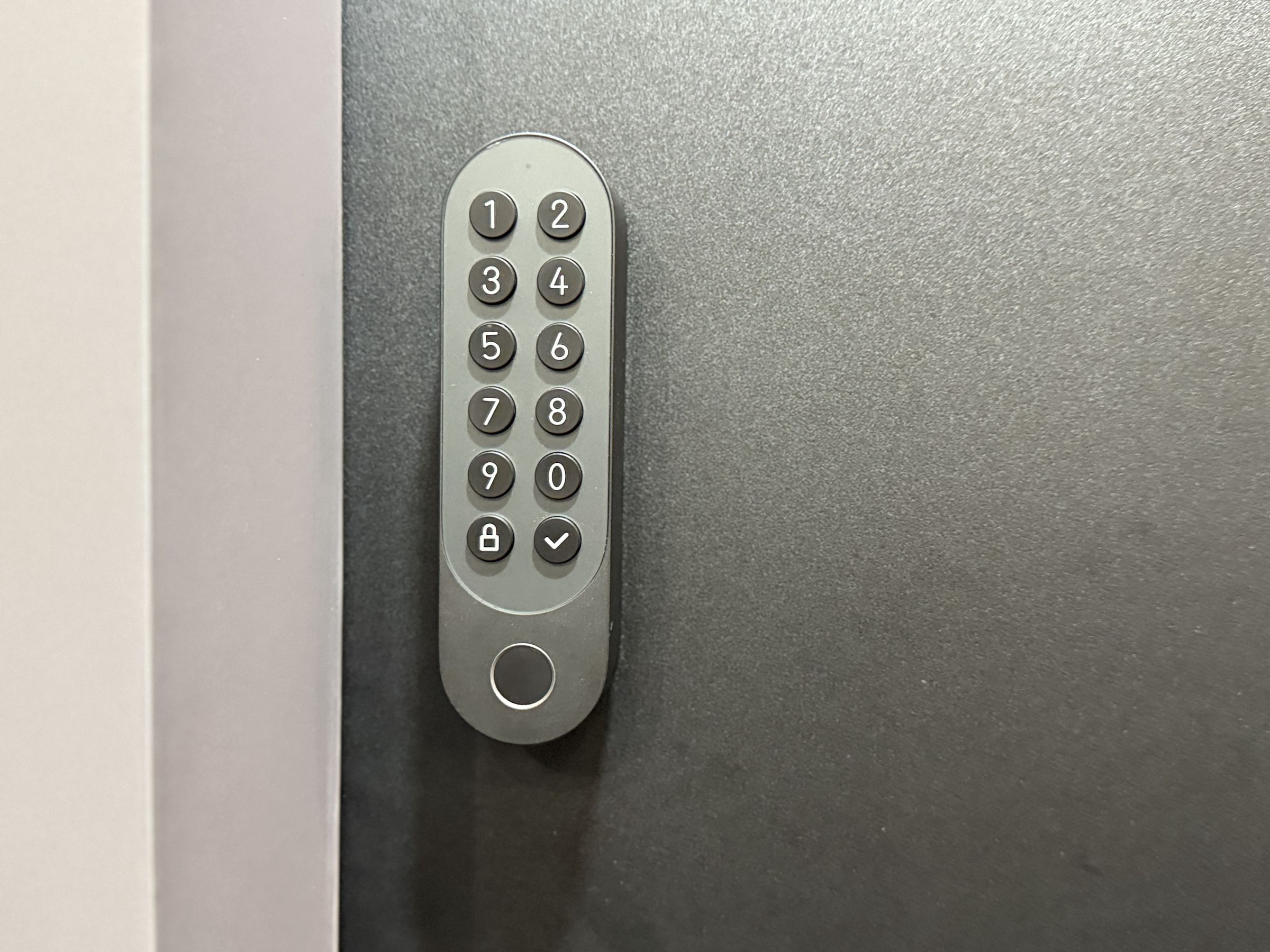 The U200 comes with a Bluetooth keypad with a fingerprint reader and support for NFC. Once the lock works with Apple Home Key, you’ll tap your phone or watch to the keypad to unlock the door.
