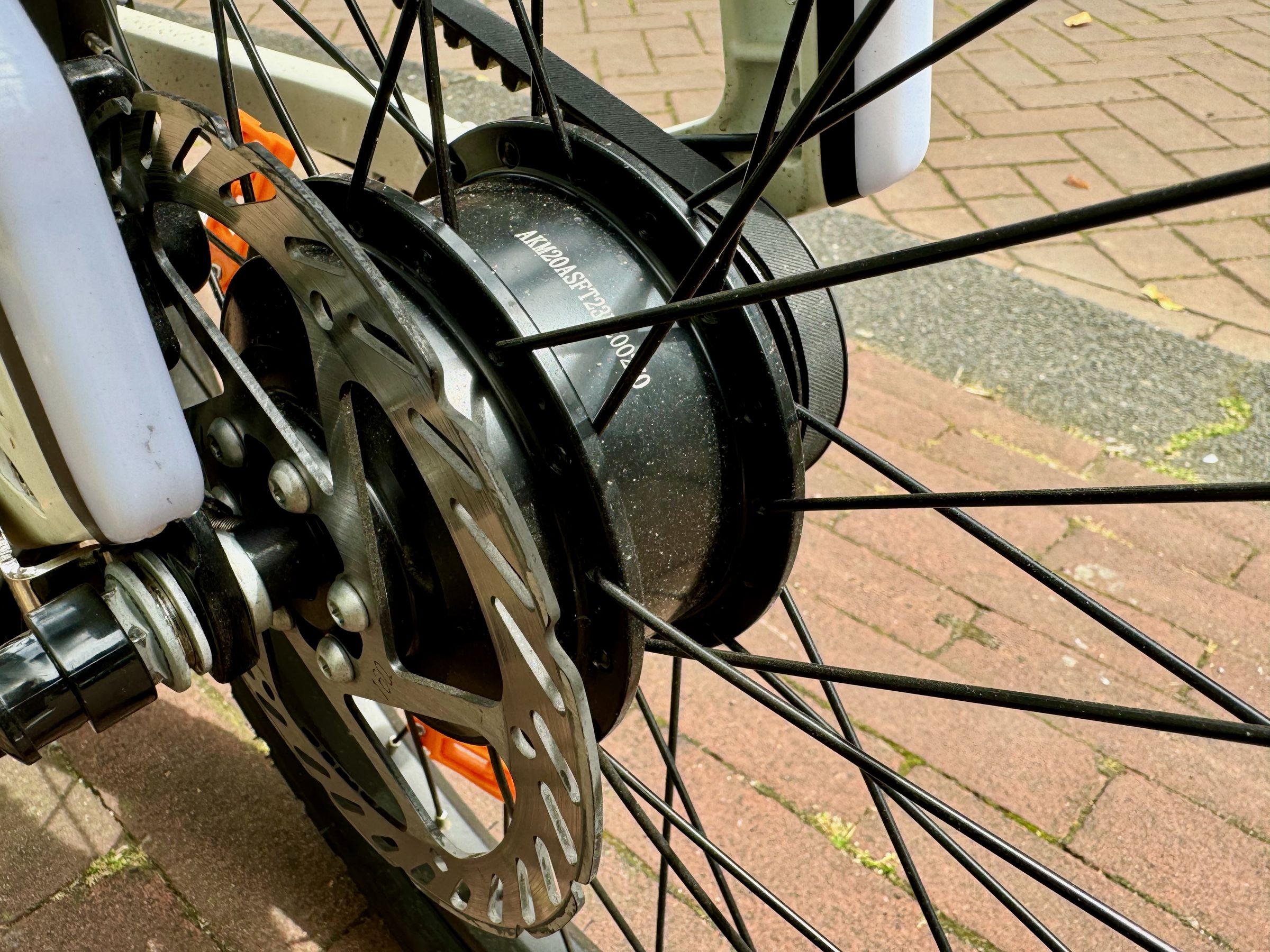 The unbranded rear-hub motor is fine and the unbranded brakes are reliable.