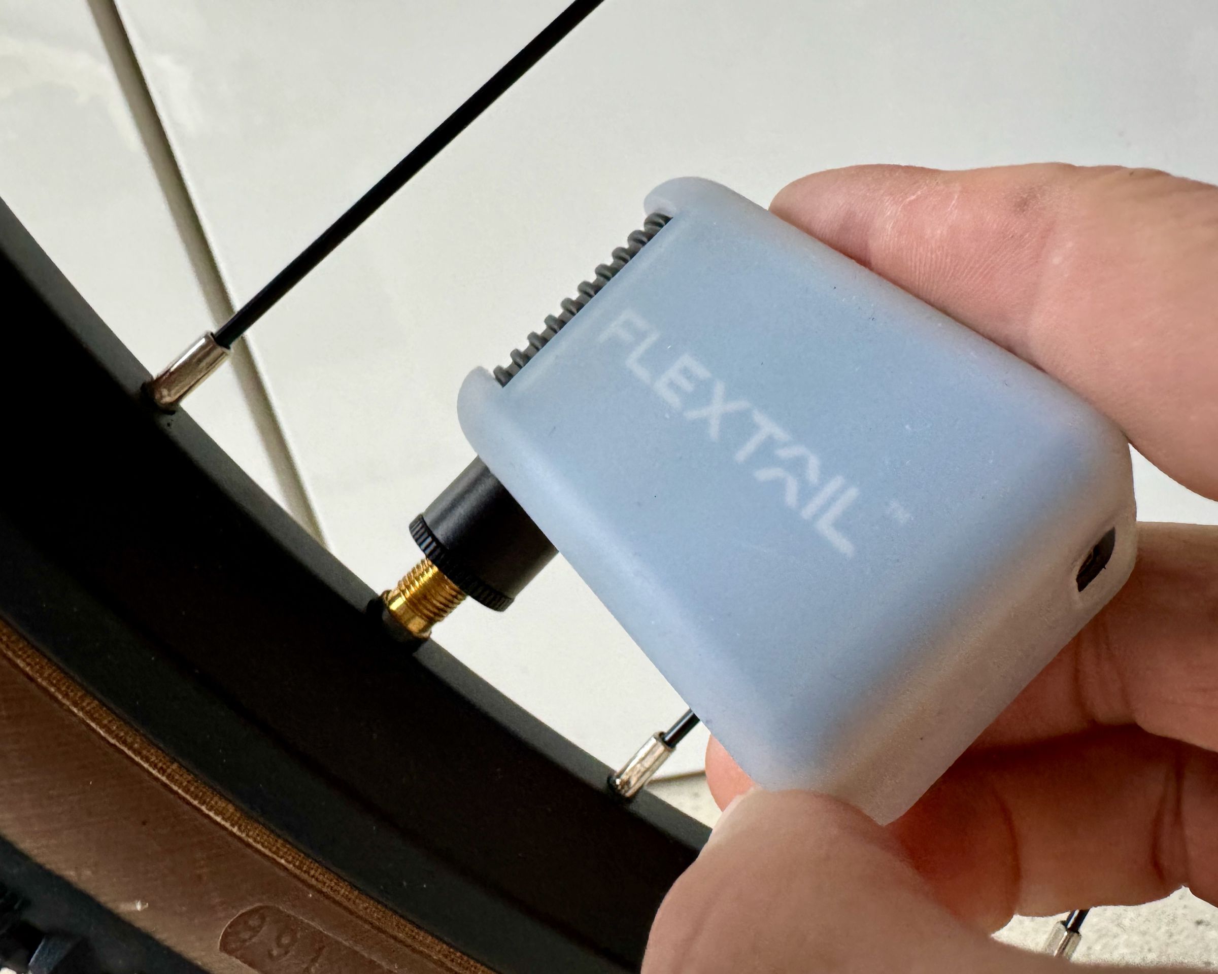 The tiny Flextail pump inflated this city bike tire in 45 seconds.