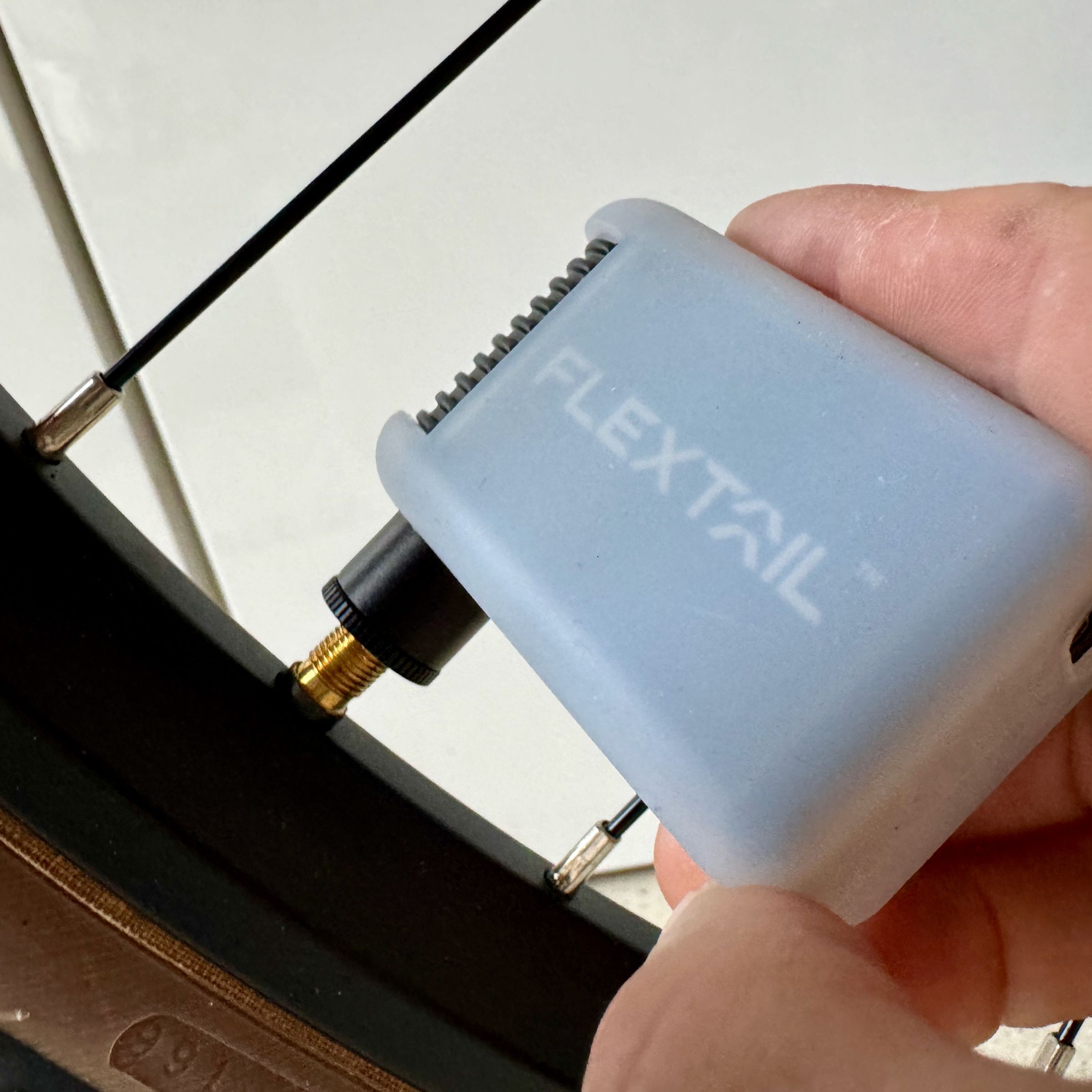 The tiny Flextail pump inflated this city bike tire in 45 seconds.