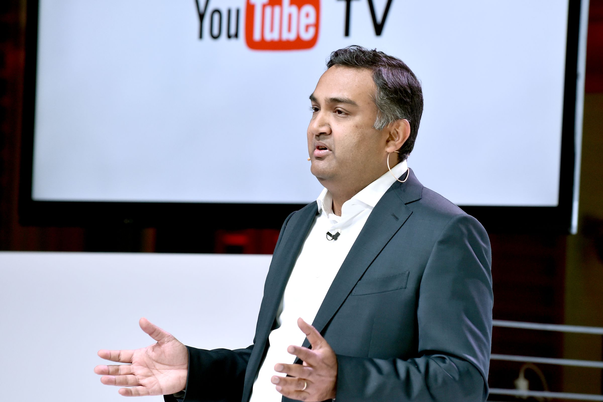 Neal Mohan, the new head of YouTube onstage presenting during the announcement for YouTube TV.