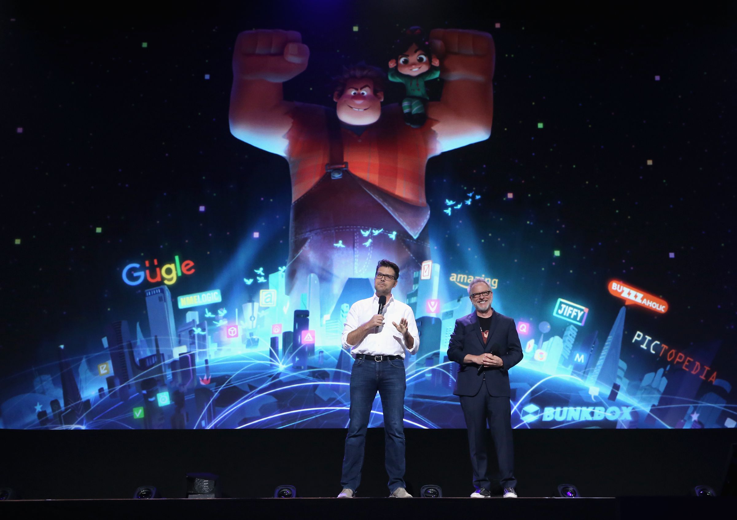 Phil Johnston and Rich Moore at the 2017 D23 Expo, with the movie’s original ‘Gügle’ concept art