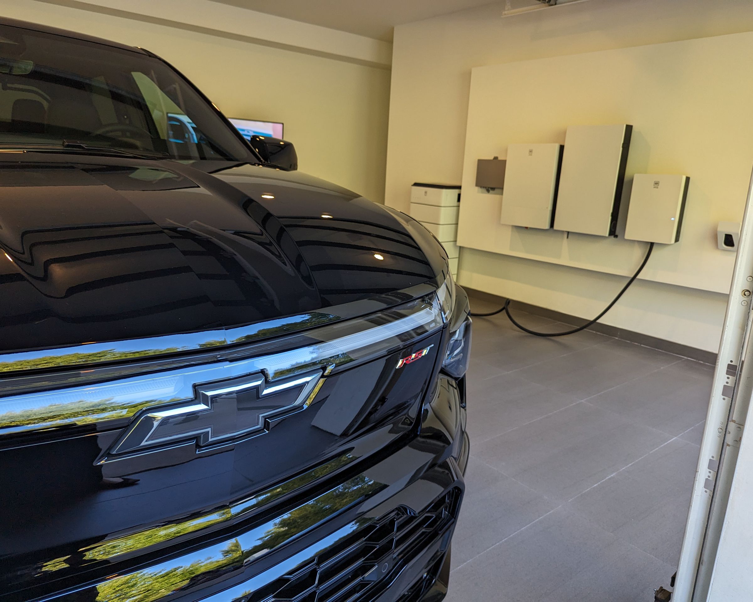 Chevy Silverado EV plugged into GM Energy batteries