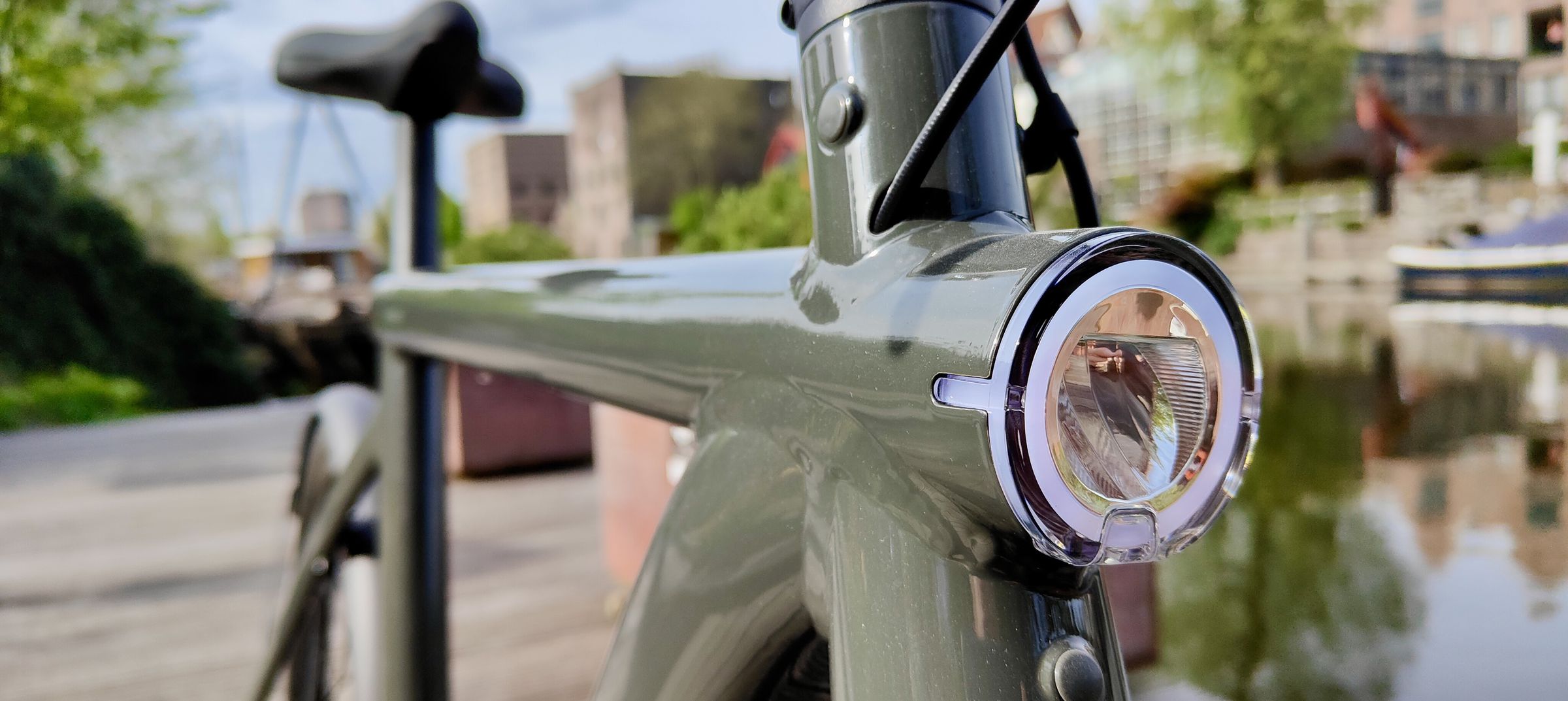 Integrated front lights and cables routed through frame.