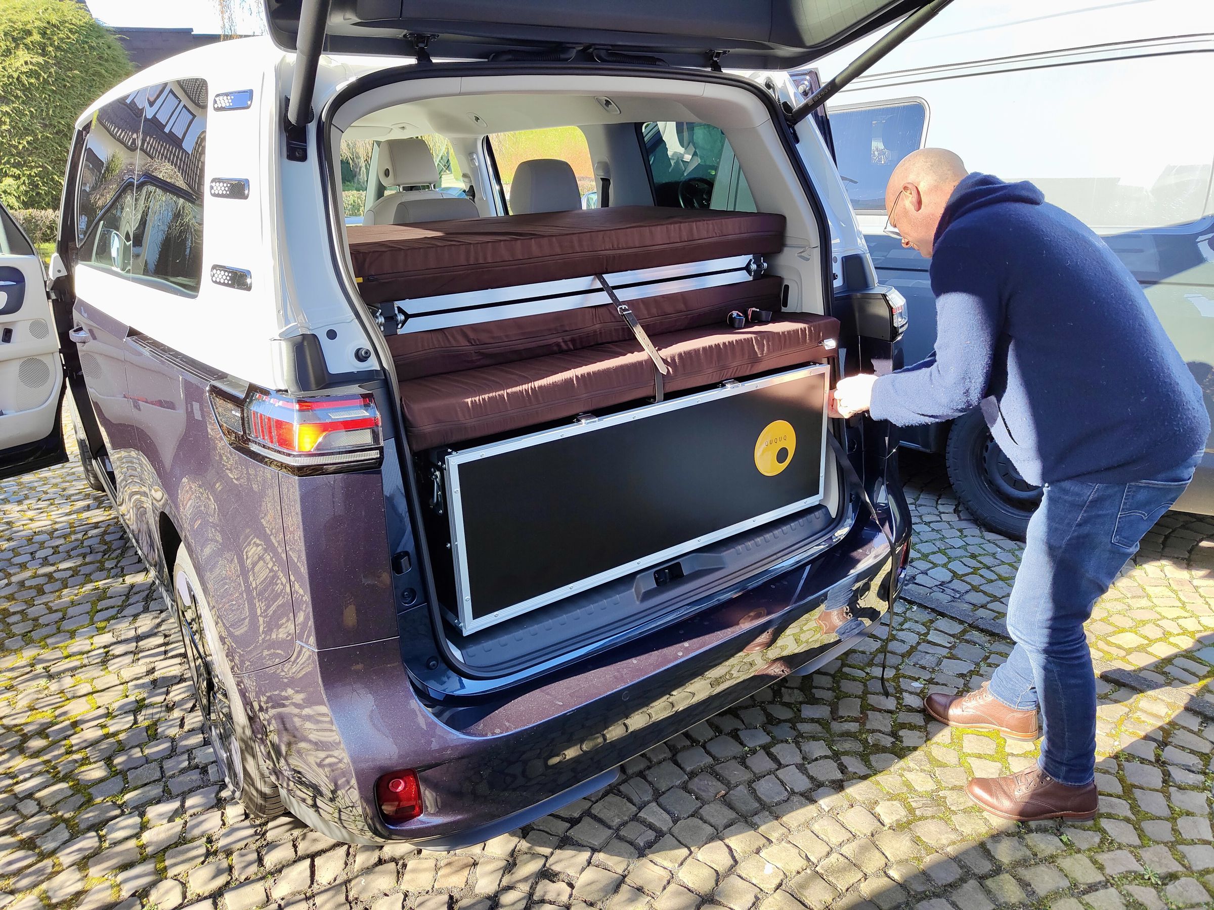 <em>Ququq founder Ulrich Vielmetter finishes up the installation outside his office in Germany. It only took about 10 minutes.</em>