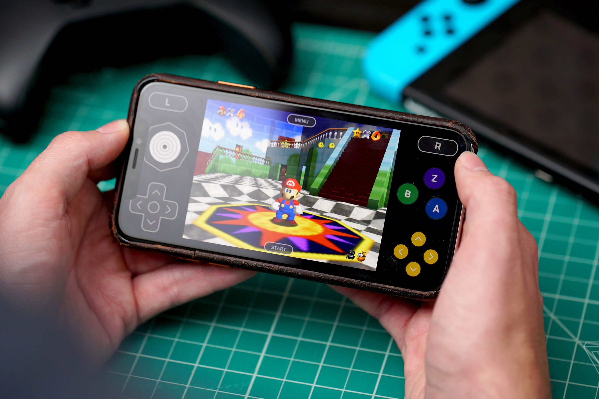 A picture of Super Mario 64 running on an iPhone.