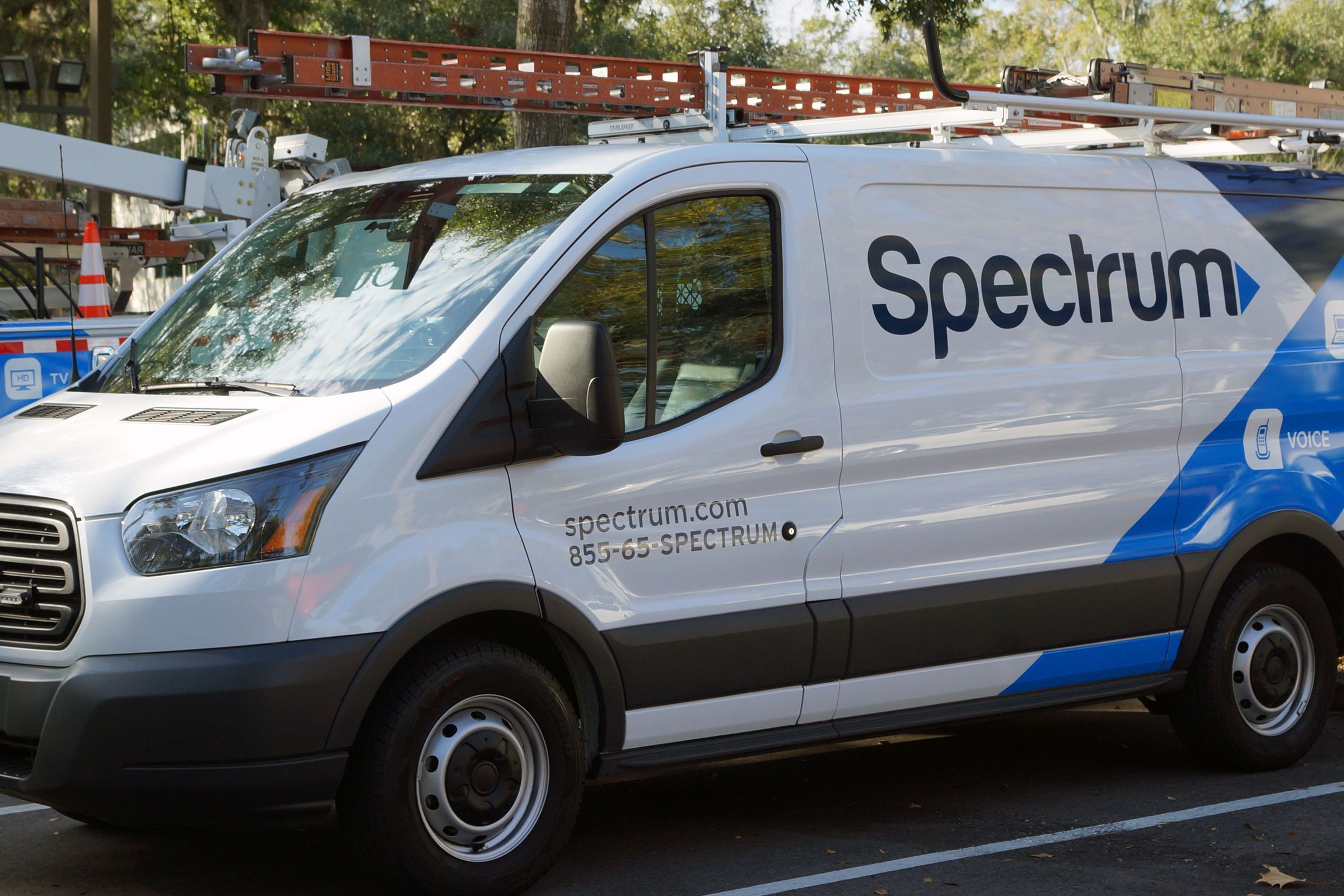 Spectrum van driven by service technicians for Charter Spectrum.