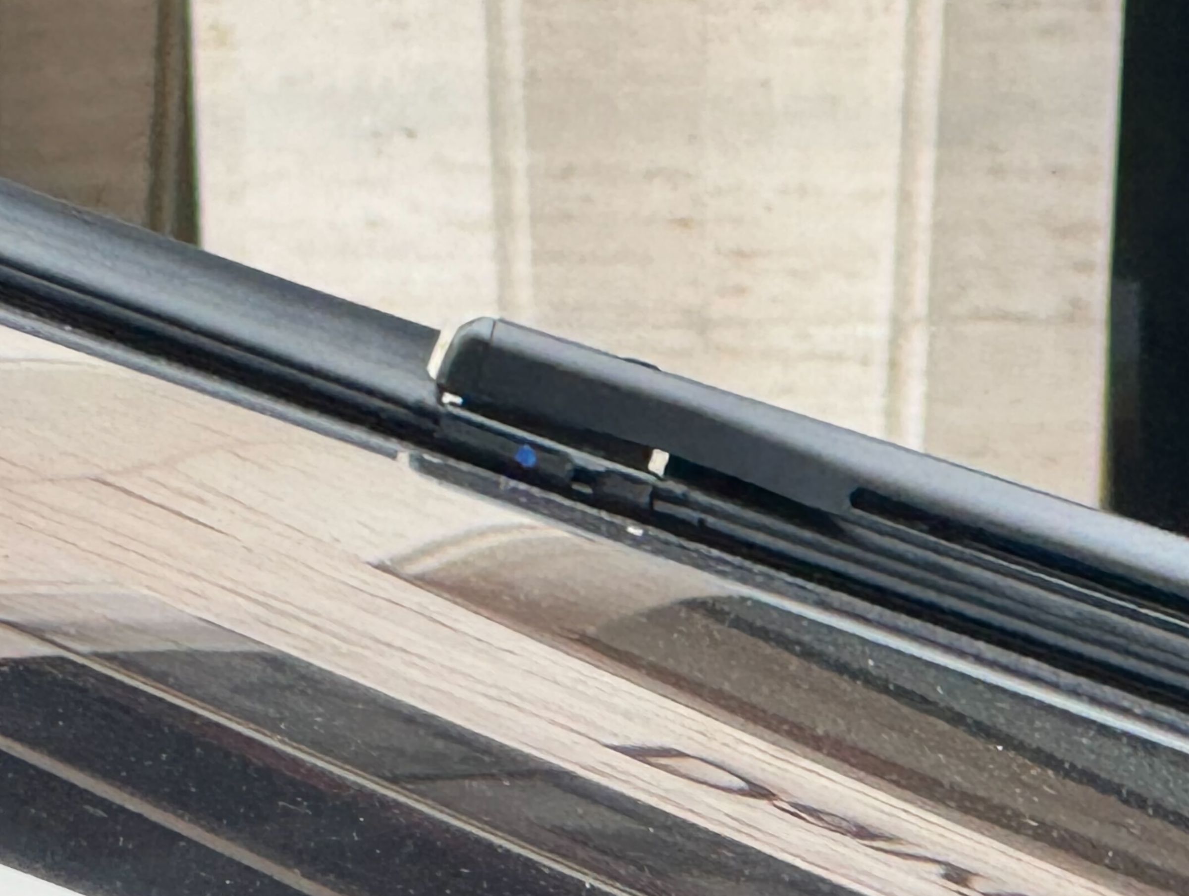 A close-up photo of the Tesla Cybertruck wiper, showing that it appears to actually be two wiper blades.