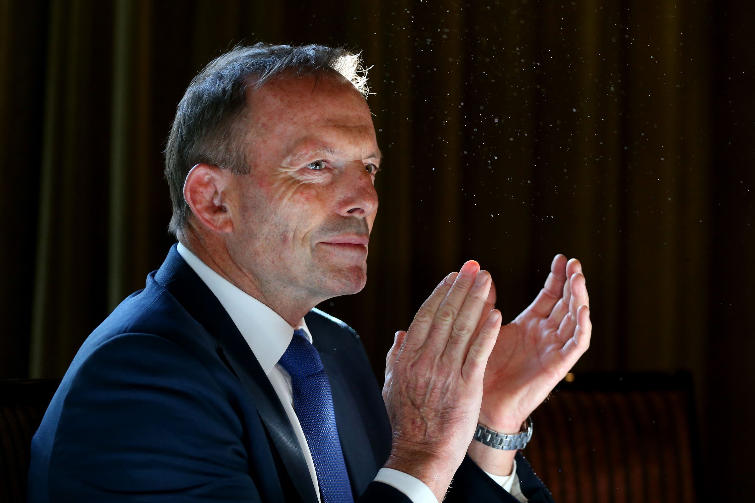 Tony Abbott clapping at a book launch